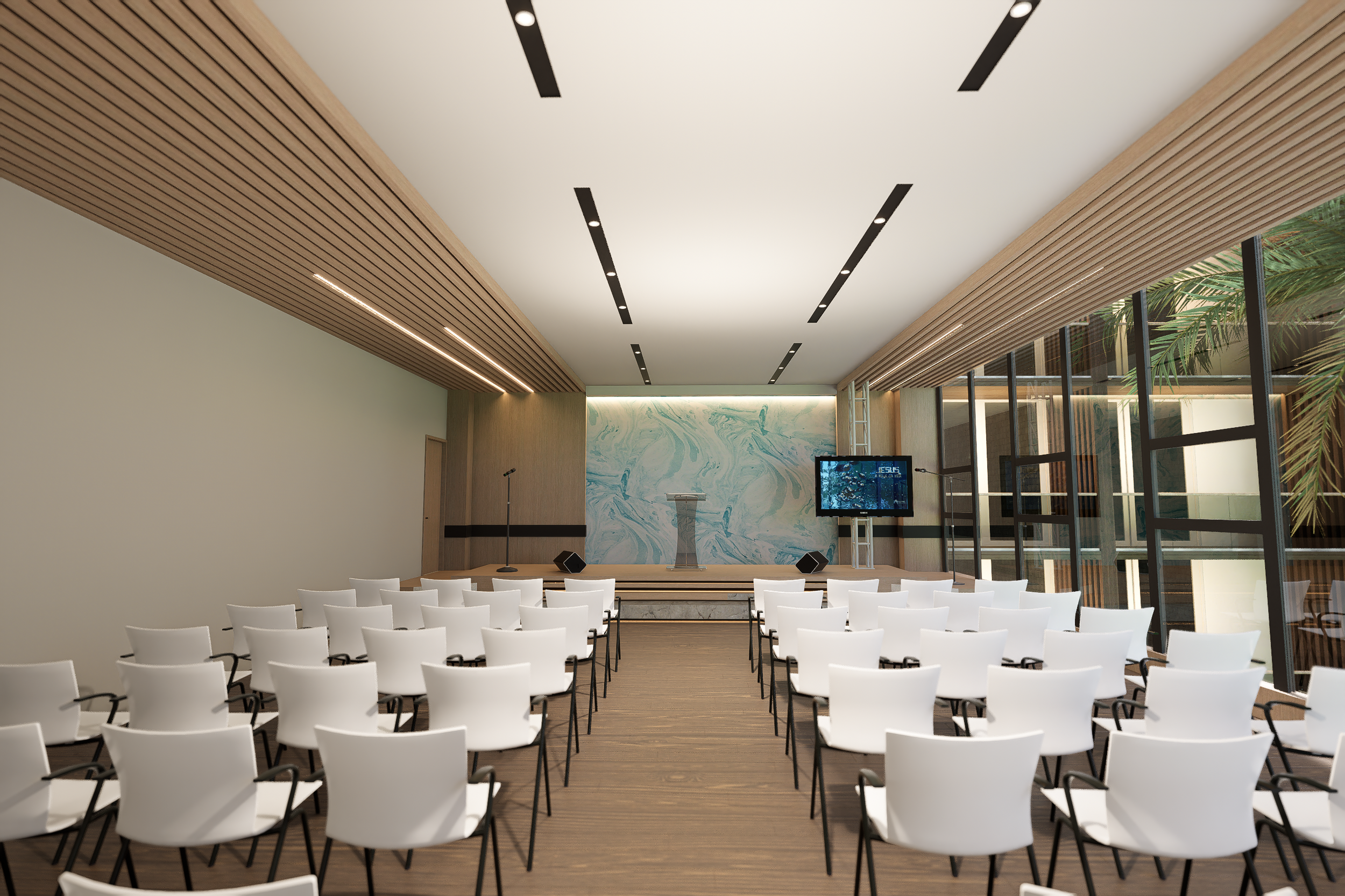 Modern conference room with rows of white chairs facing a stage, podium, microphone, and a flat-screen, ideal for business events, investment summits, and corporate networking in luxury real estate venues.