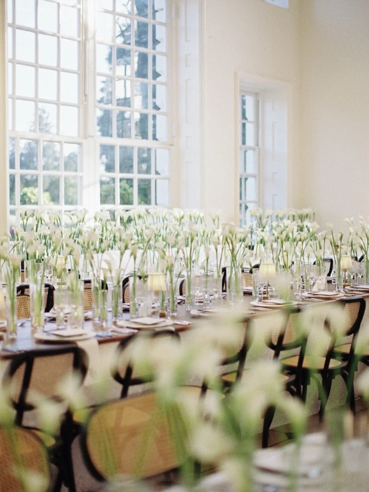 I have a thing with single type flowers en masse. There is an undisputed elegance about it all! For Elizabeth &amp; Brandon&rsquo;s beautiful dinner we had approximately 2000 white calla lillies dress the sensational Orangerie dining space at Kew Gar