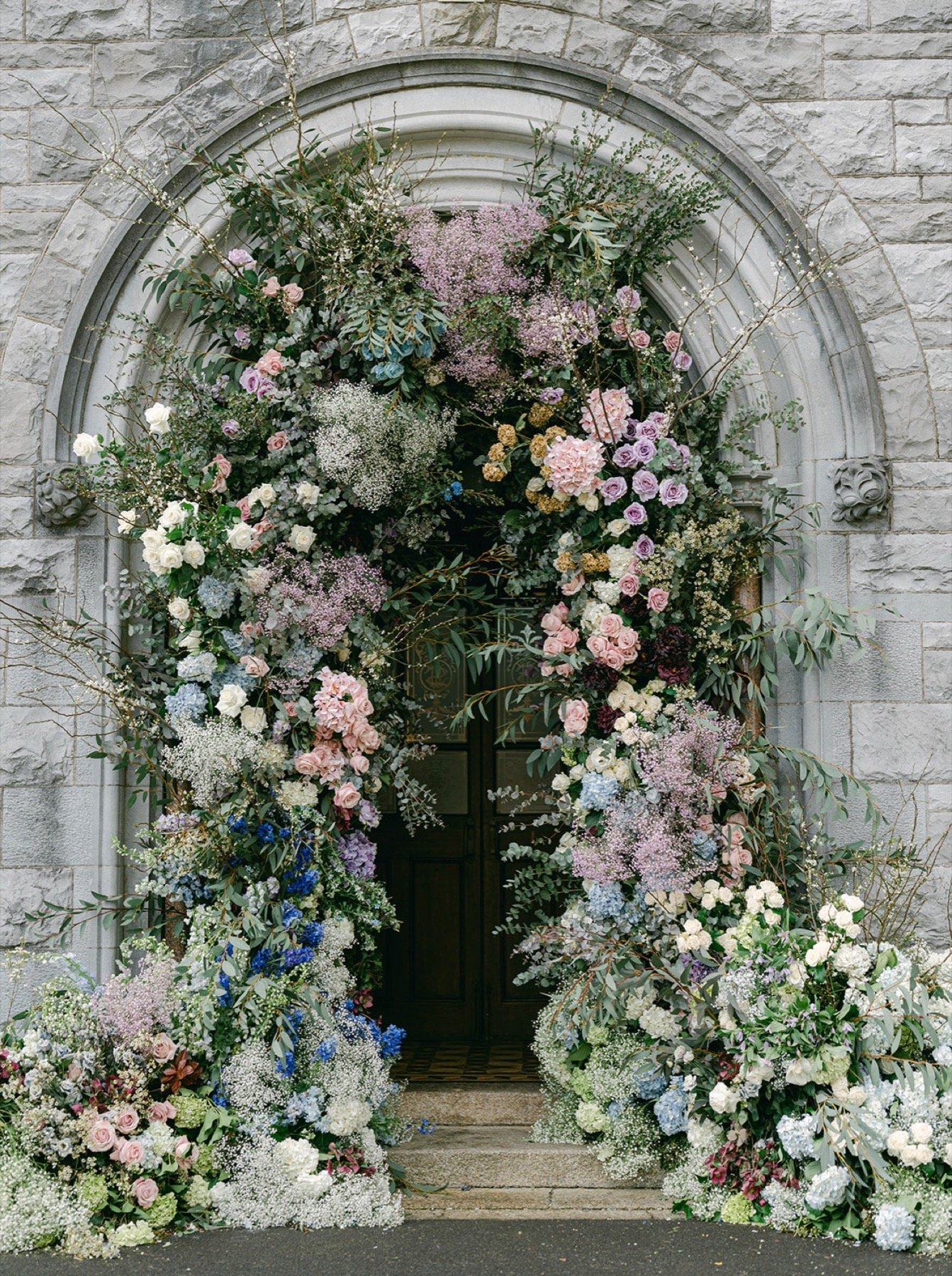 wedding-entrance-arch-flowers-pastel-colours.jpg