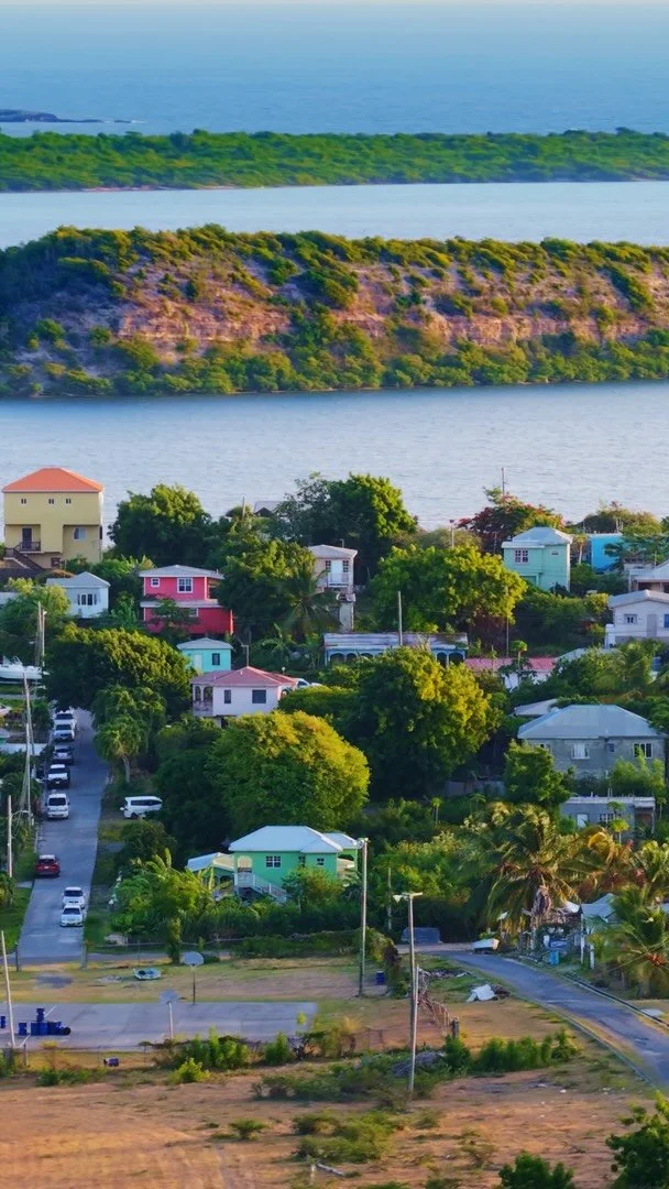Quiet Mornings in Willikies 🏡
Willikies is a humble coastal village in Antigua’s eastern shore, facing the Atlantic Ocean. Its Vibrant homes tell the story of local life and heritage. Really loved the gentle hills that formed this beautiful