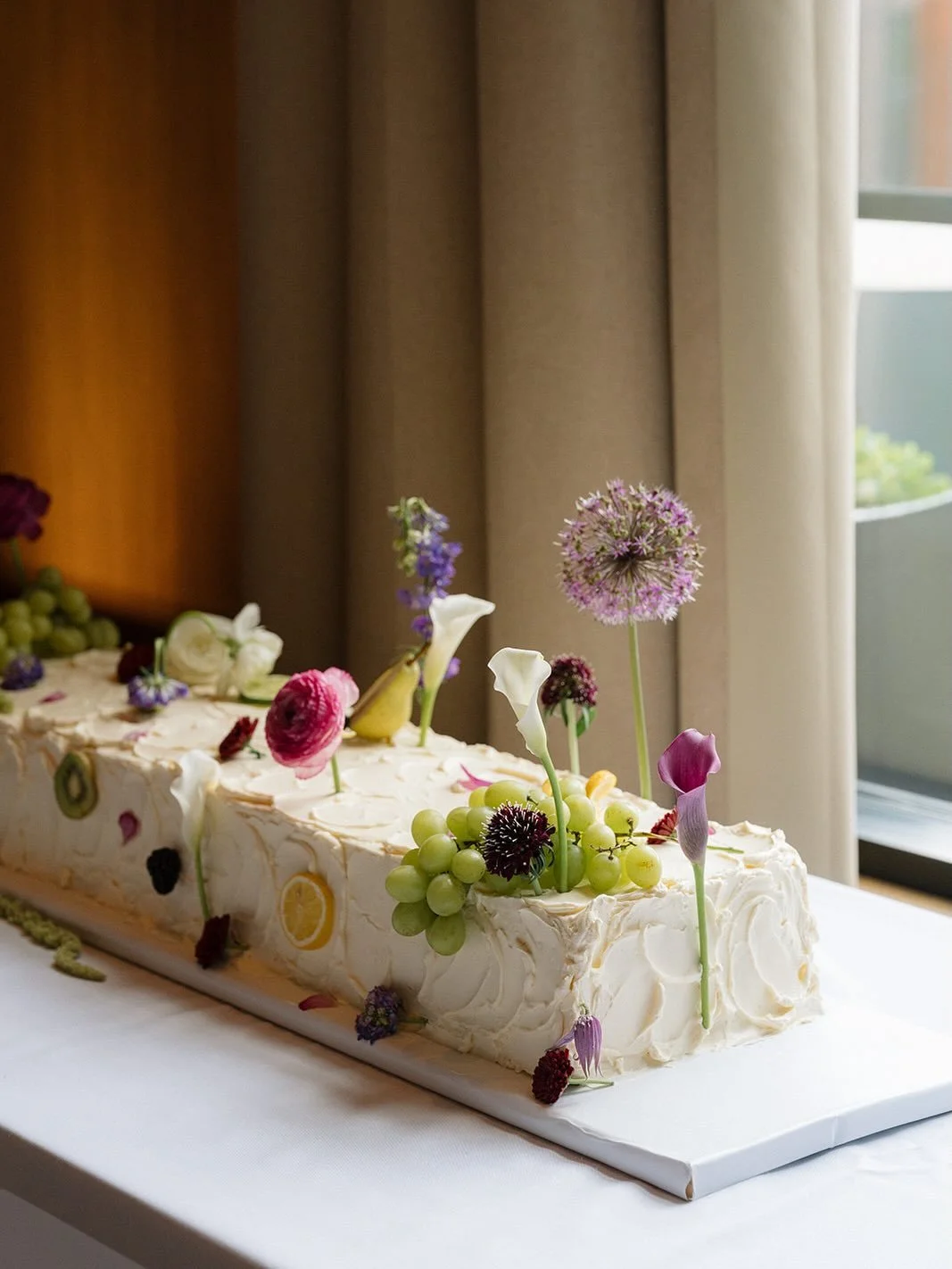 Chelsea &amp; Matt&rsquo;s 42&rdquo; long wedding cake was a DREAM to create. With light &amp; airy &amp; playful colors it was such a breathe of fresh air and a beautiful way to kick off wedding season! 🥝💜

Planning: @vows.xo 
Photography: @annied
