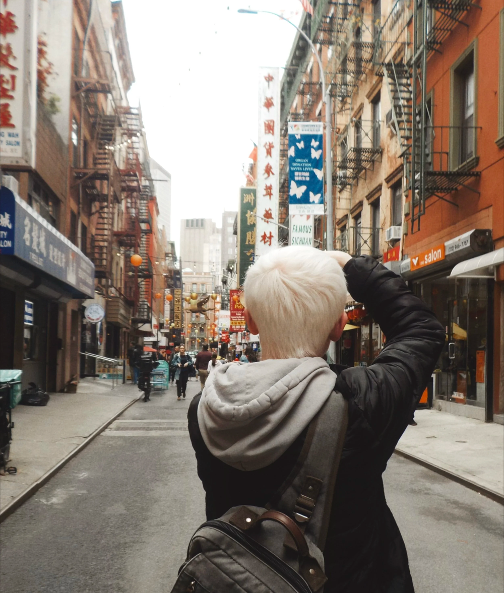 Grayson Harris photographing a city street