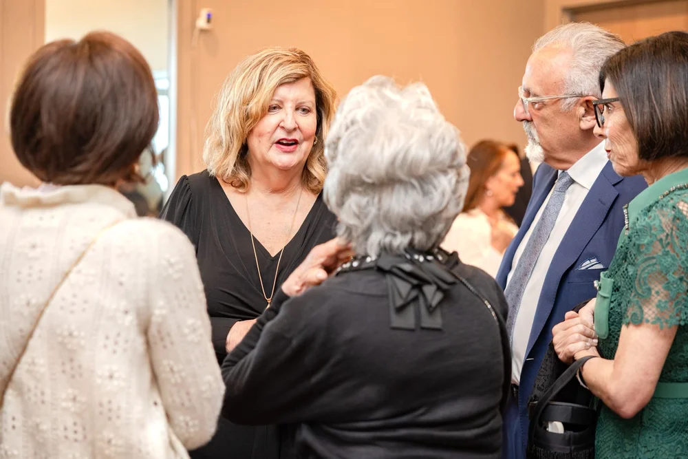 Attendees networking during a professional event in Colorado
