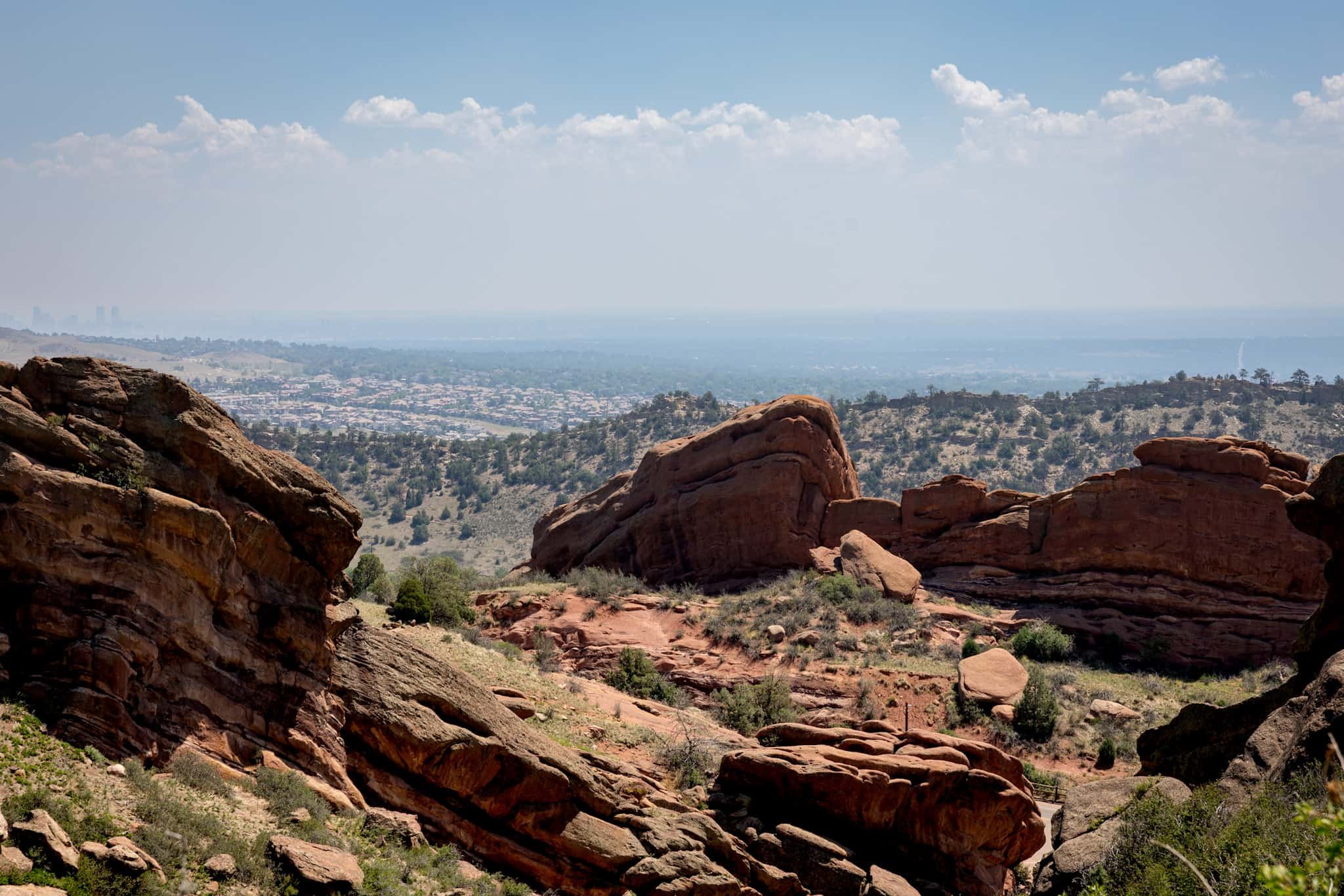 Wedding photography at Red Rocks Amphitheatre in Morrison, Colorado with scenic red rock formations and natural mountain landscapes.
