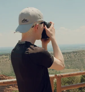 Grayson Harris, Denver photographer, photographing at Red Rocks in Colorado