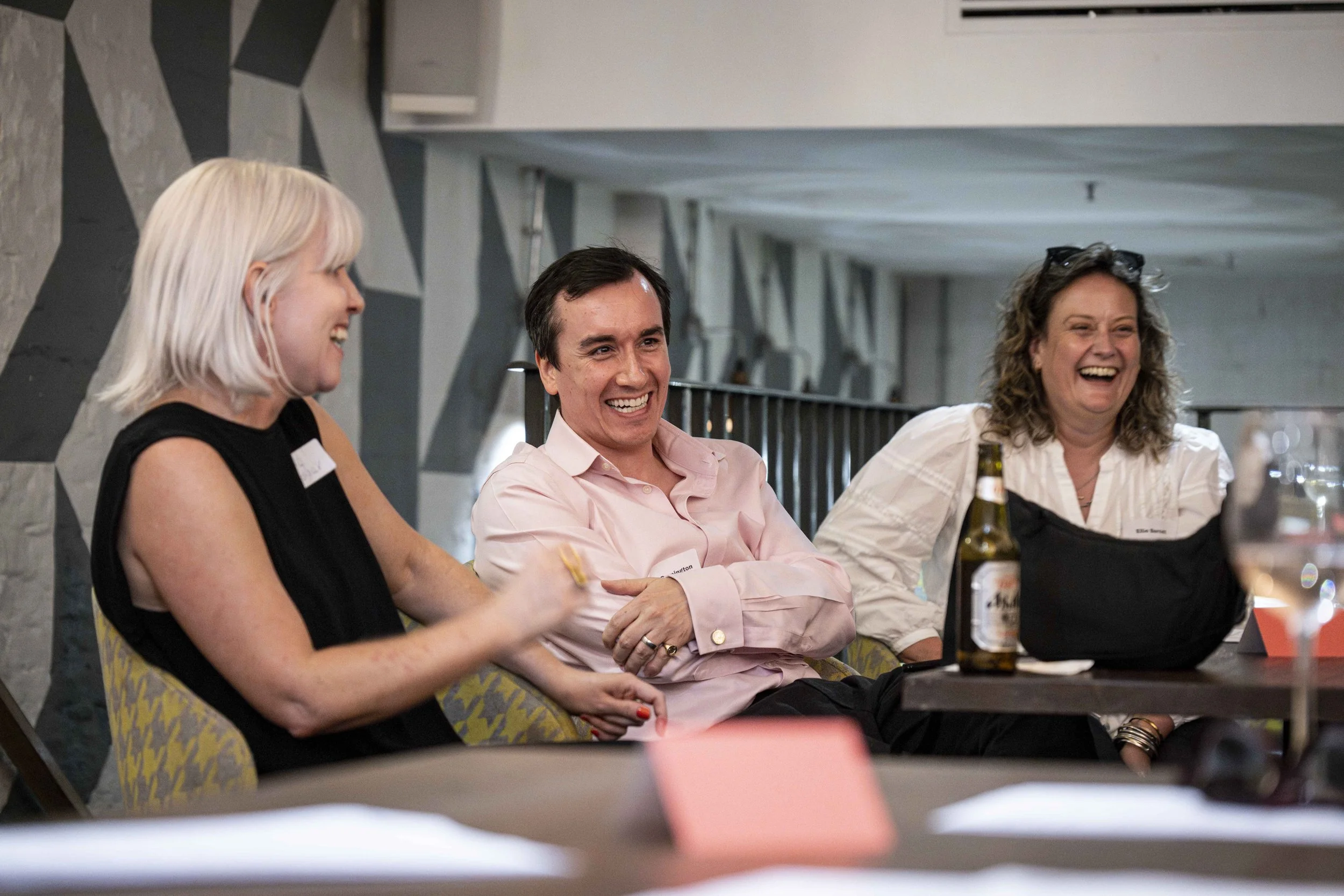 Participants laughing and engaging in conversation during an On Sale Live Lates industry networking session.