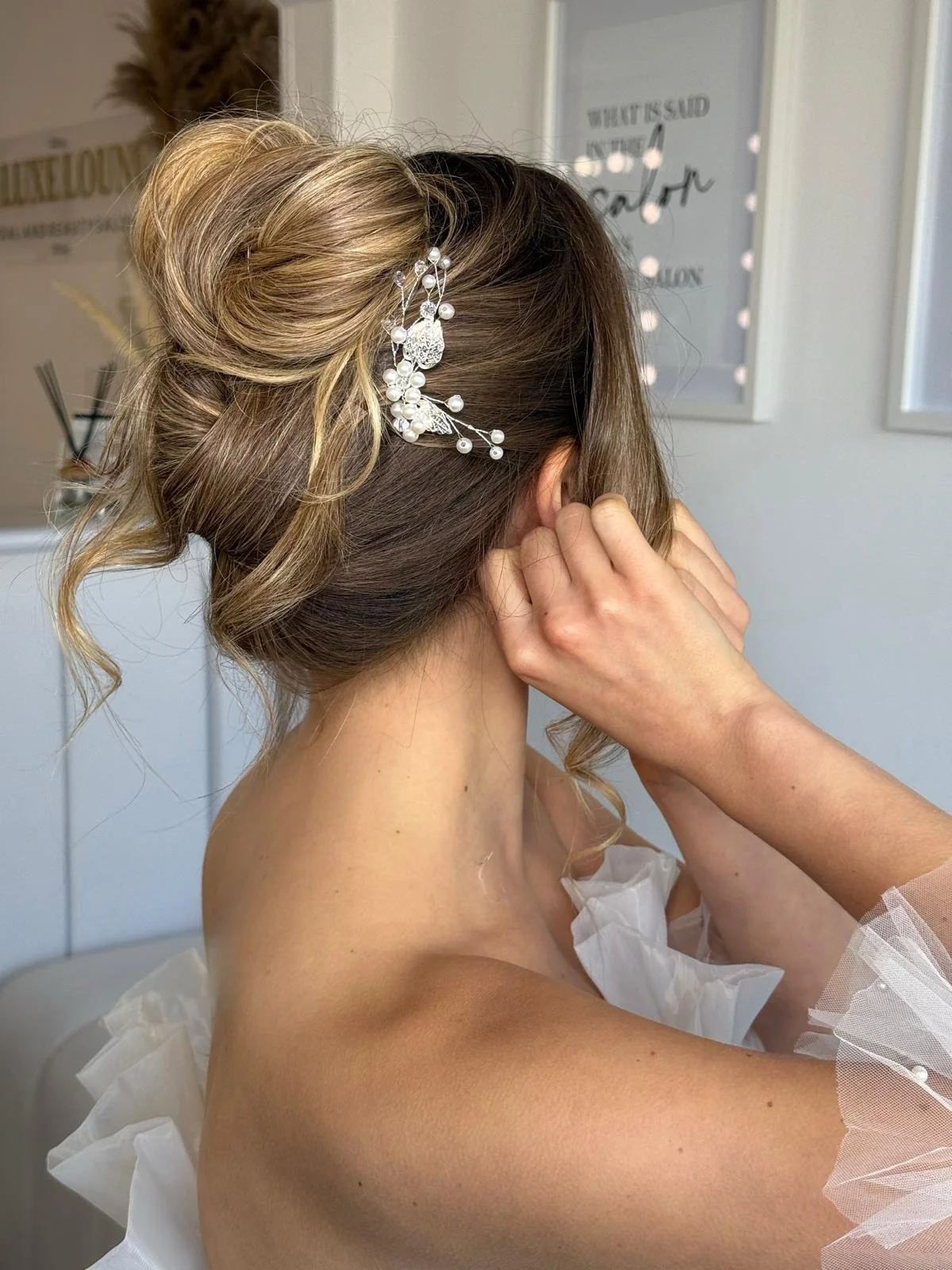 Bridal modern french twist with flower accesory