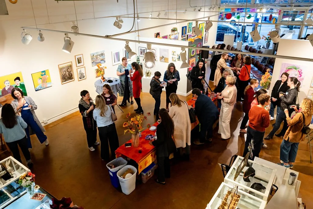 Aerial view of the pre-event networking for Poppy Candid at Columbia City Gallery.