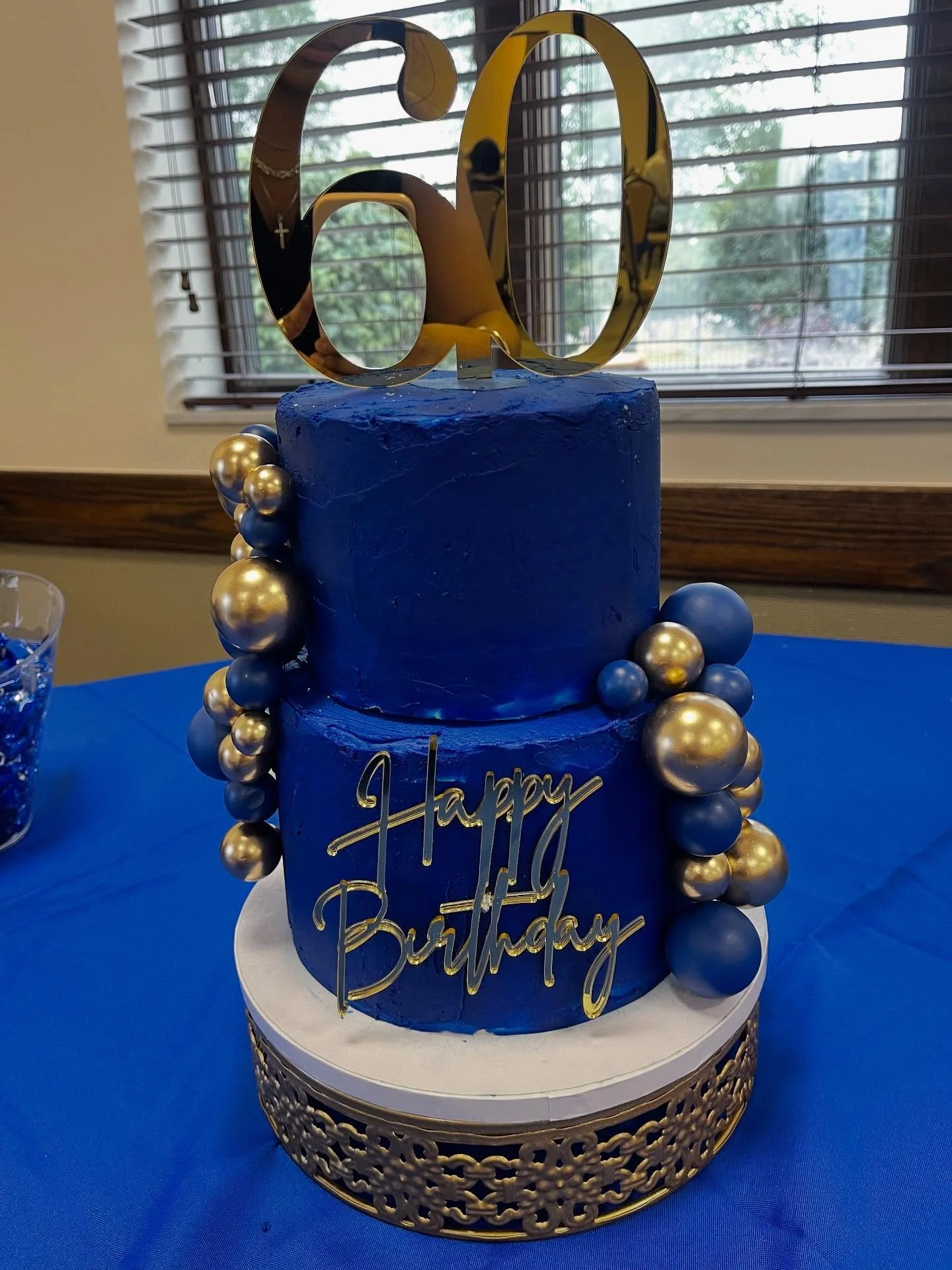 🎉 Celebrating 60 Sweet Years! 🎉
We were honored to be part of this unforgettable 60th birthday celebration! 💙💛

This elegant dessert spread featured:
🍰 A two-tier vanilla cake with rich vanilla bean buttercream
🧁 Matching cupcakes for a sweet l