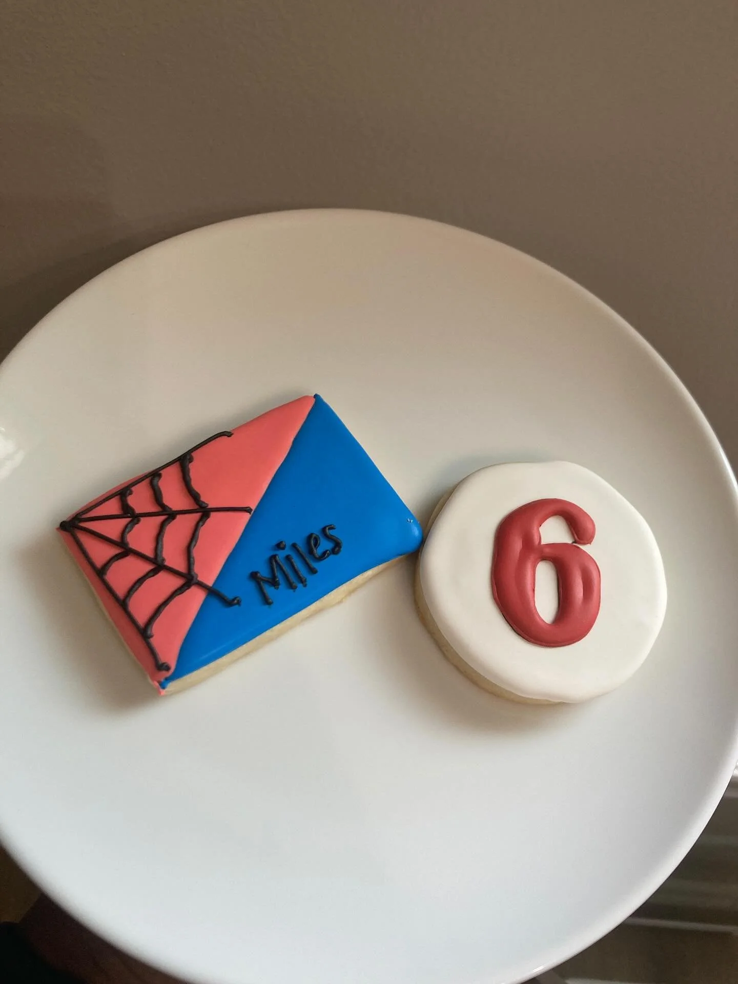 Spidey senses say&hellip; it&rsquo;s cookie time! 🕷️✨

Our royal icing cookies are swinging in to steal the show at your next event &mdash; so good, even superheroes can&rsquo;t resist! 💥
🎉 Book your dozen today and make your next celebration amaz