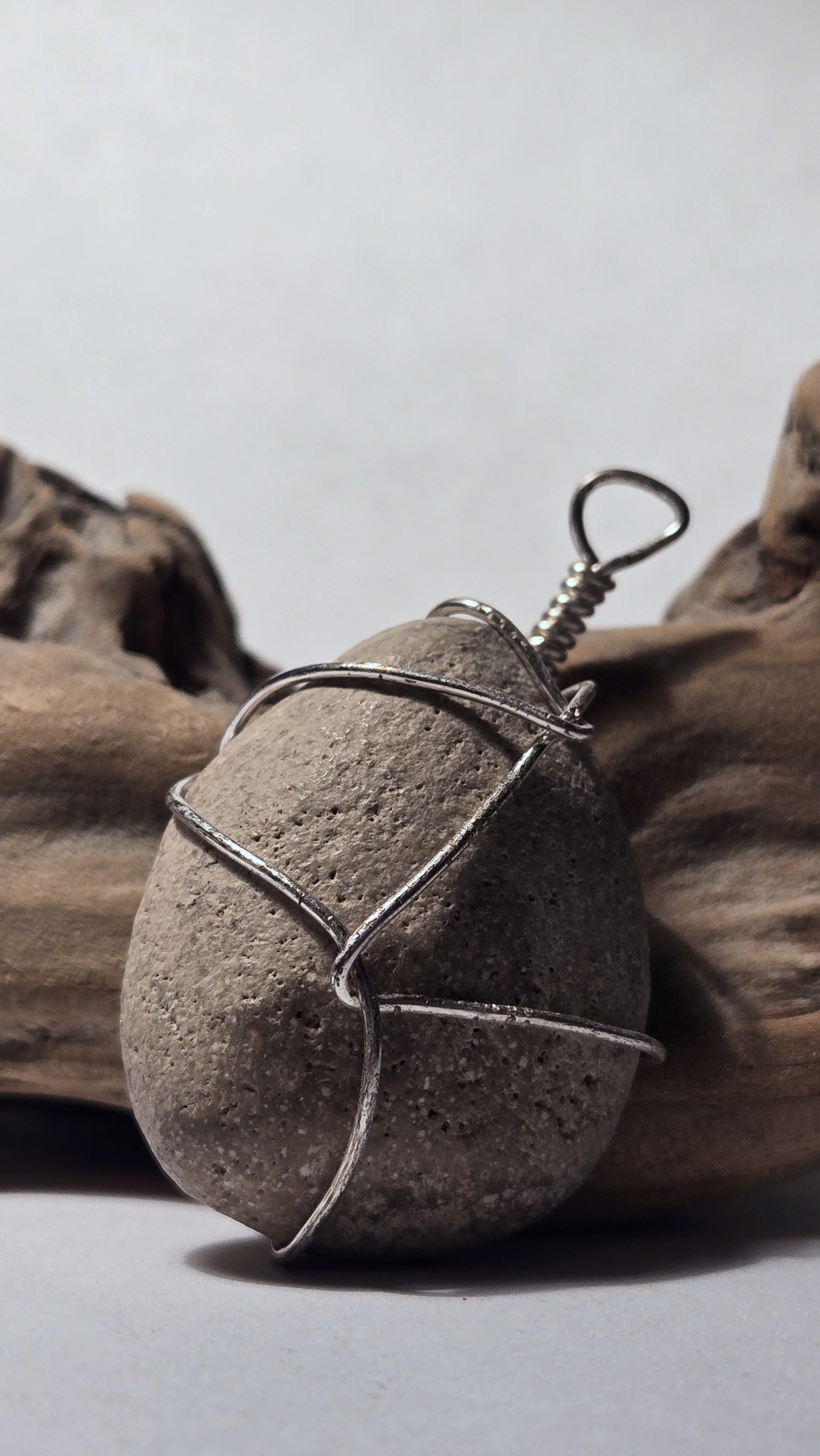 Matte brown rock pendant with silver wire