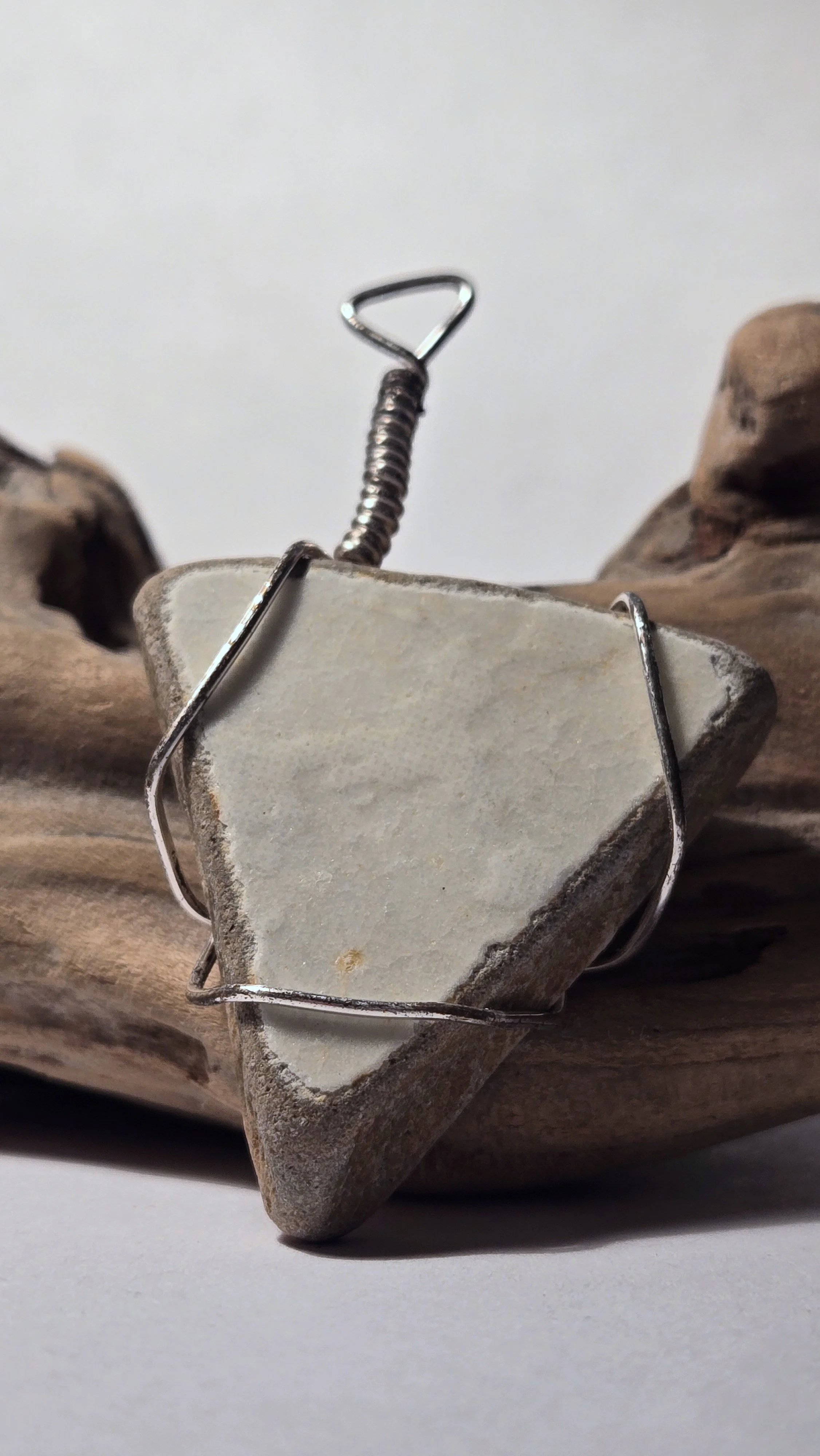 Two-tone cream and brown tile pendant with silver wire