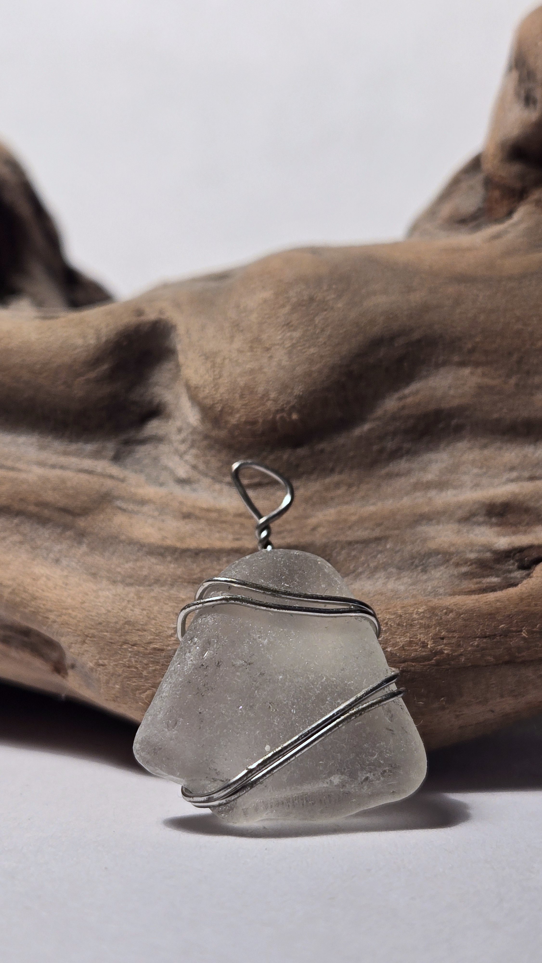 Clear seaglass pendant with silver wire
