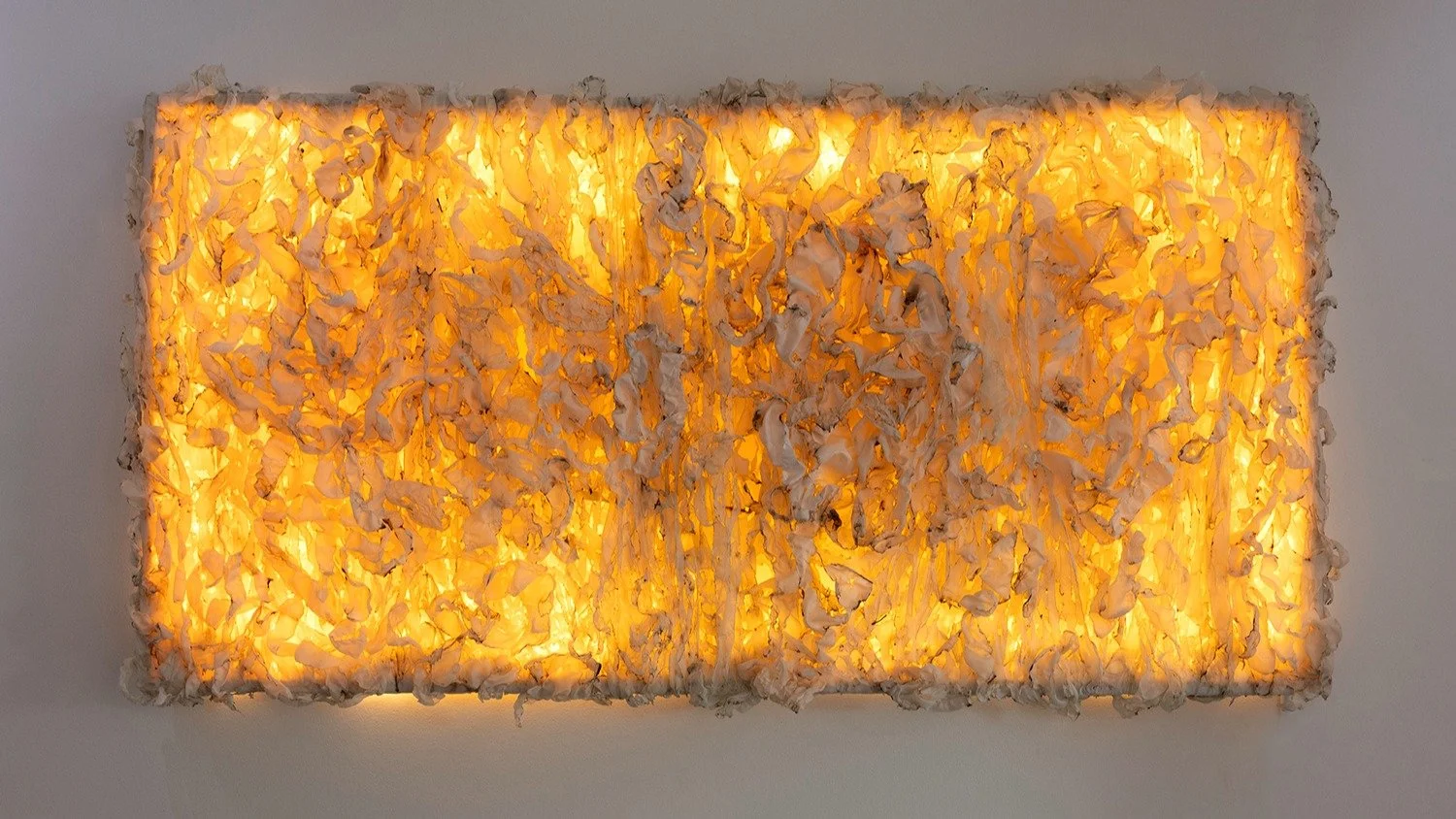 This piece is a mix of fabric and light. By carefully building up the fabric, I wanted to achieve a layout that mimics the warmth and radiance of a rising sun.

To me, it represents a fresh start. To someone else, it might mean something totally diff