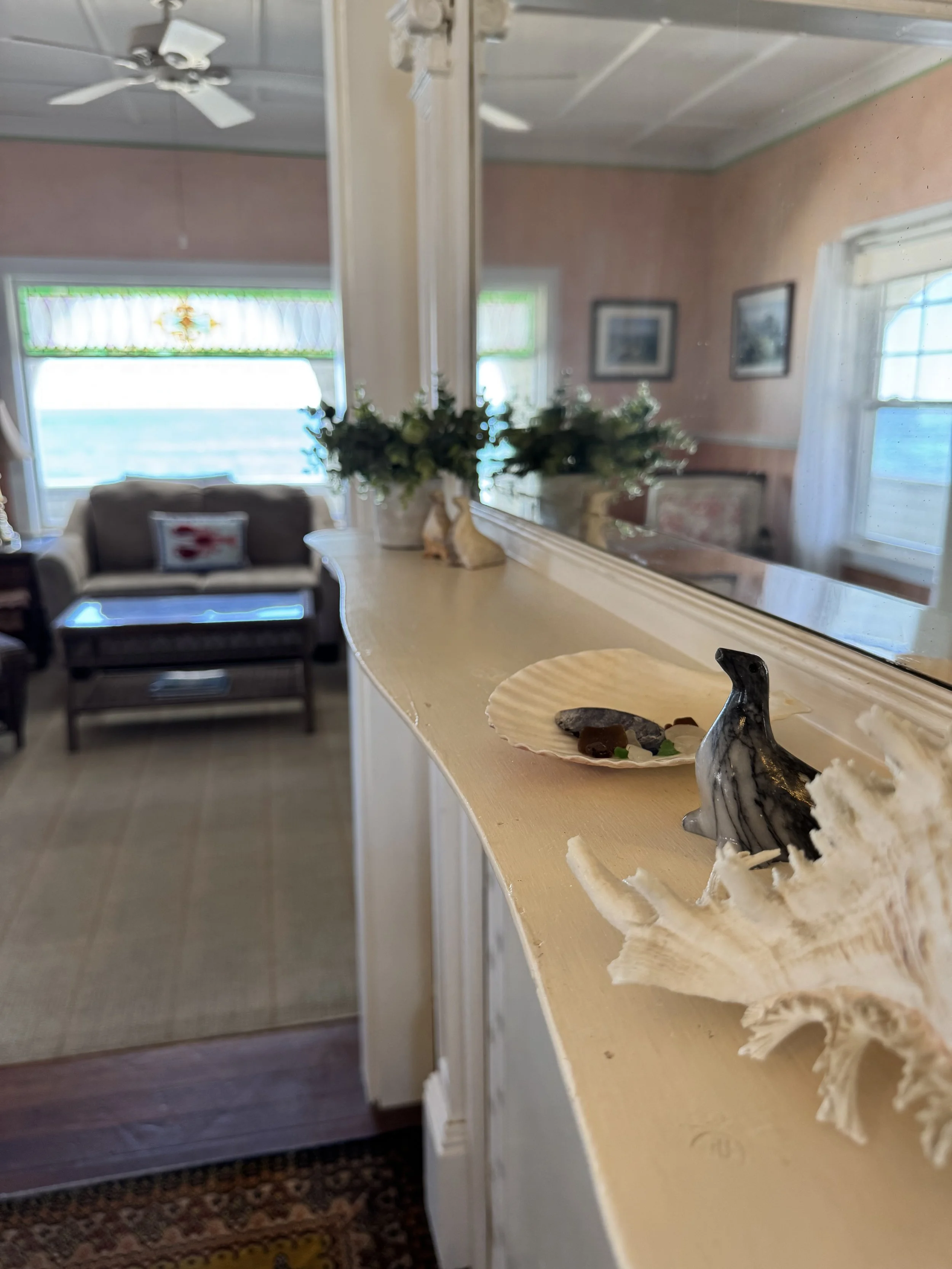 The Dining Room Looking into the living room with the ocean beyond. 