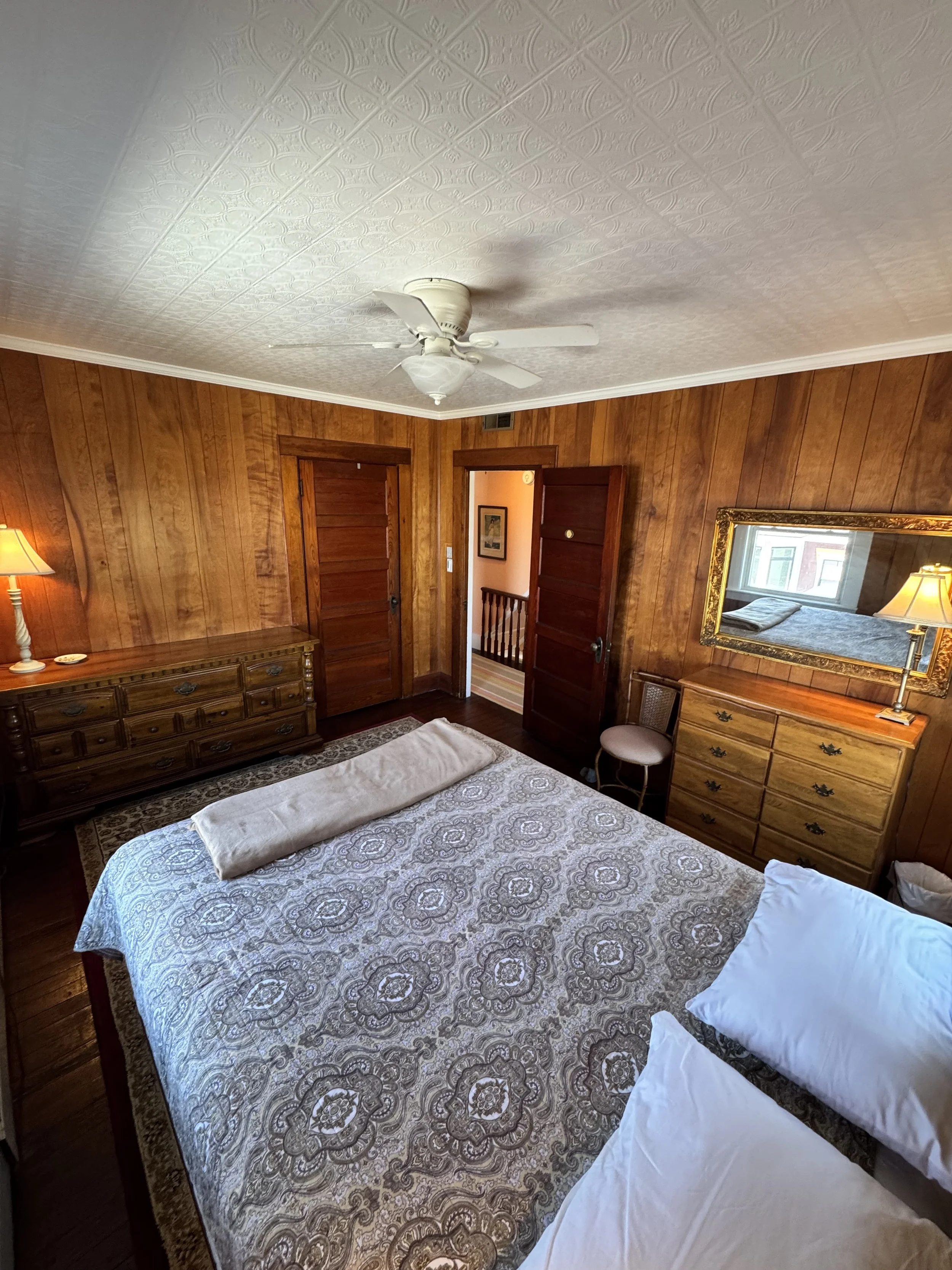 Bedroom #2: Second floor bedroom features one queen bed. 