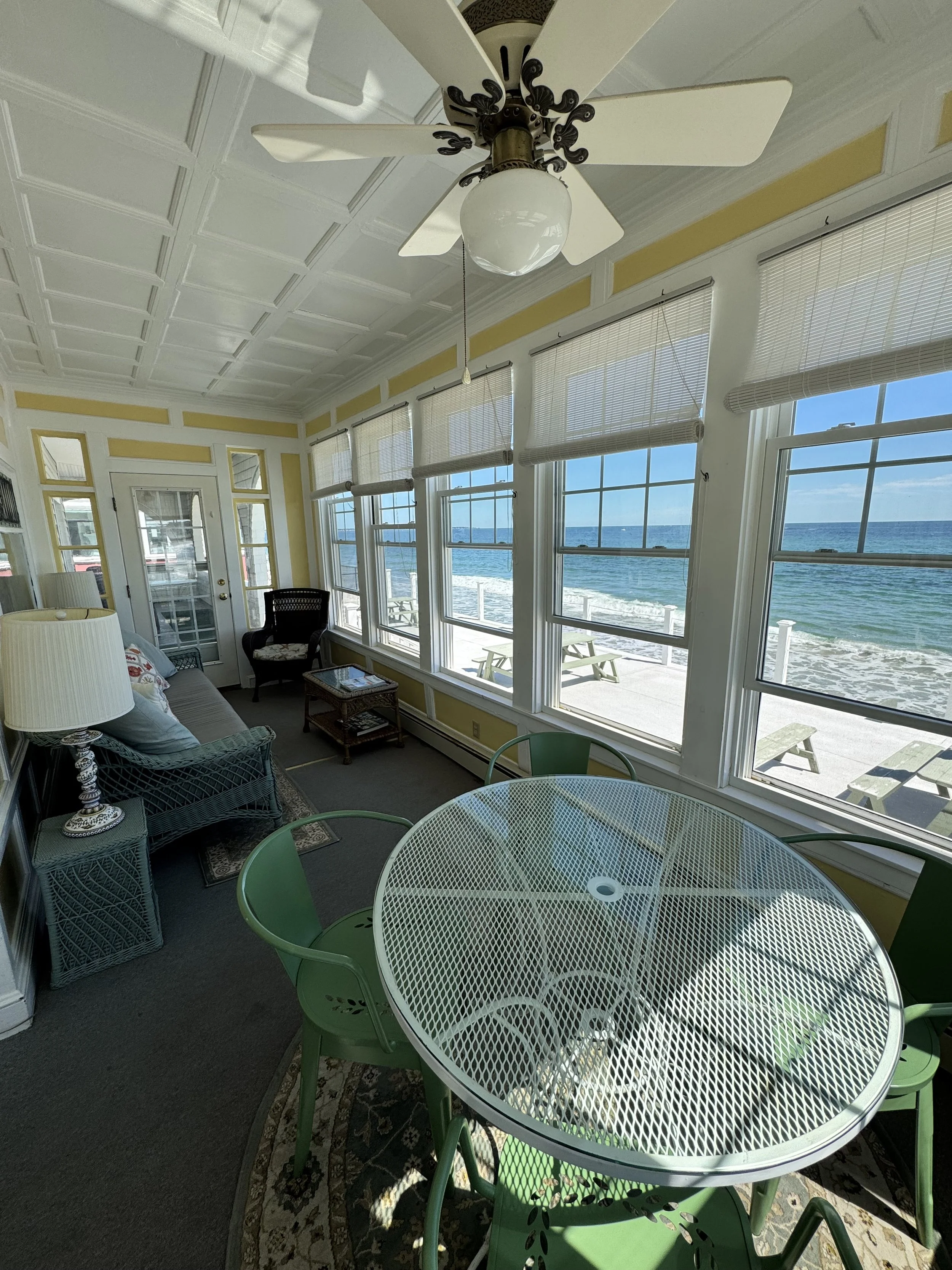 The sunroom features stunning, unobstructed views of the Atlantic ocean