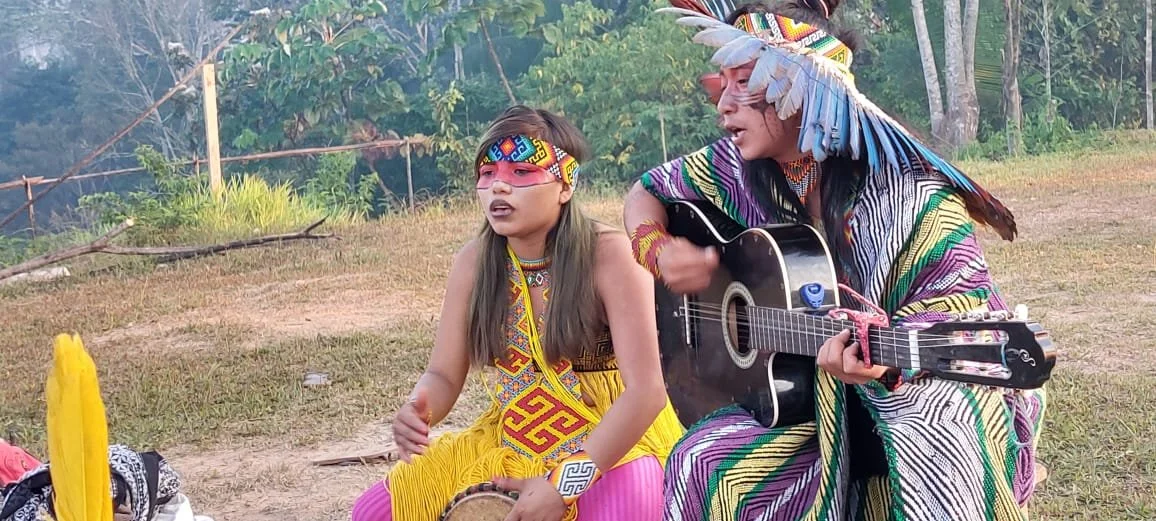 Vimi girl and elder.jpeg