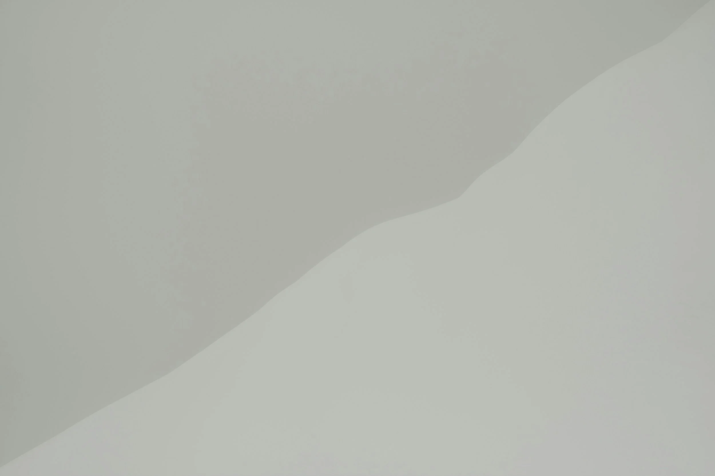Minimalist abstract gradient design in light gray tones