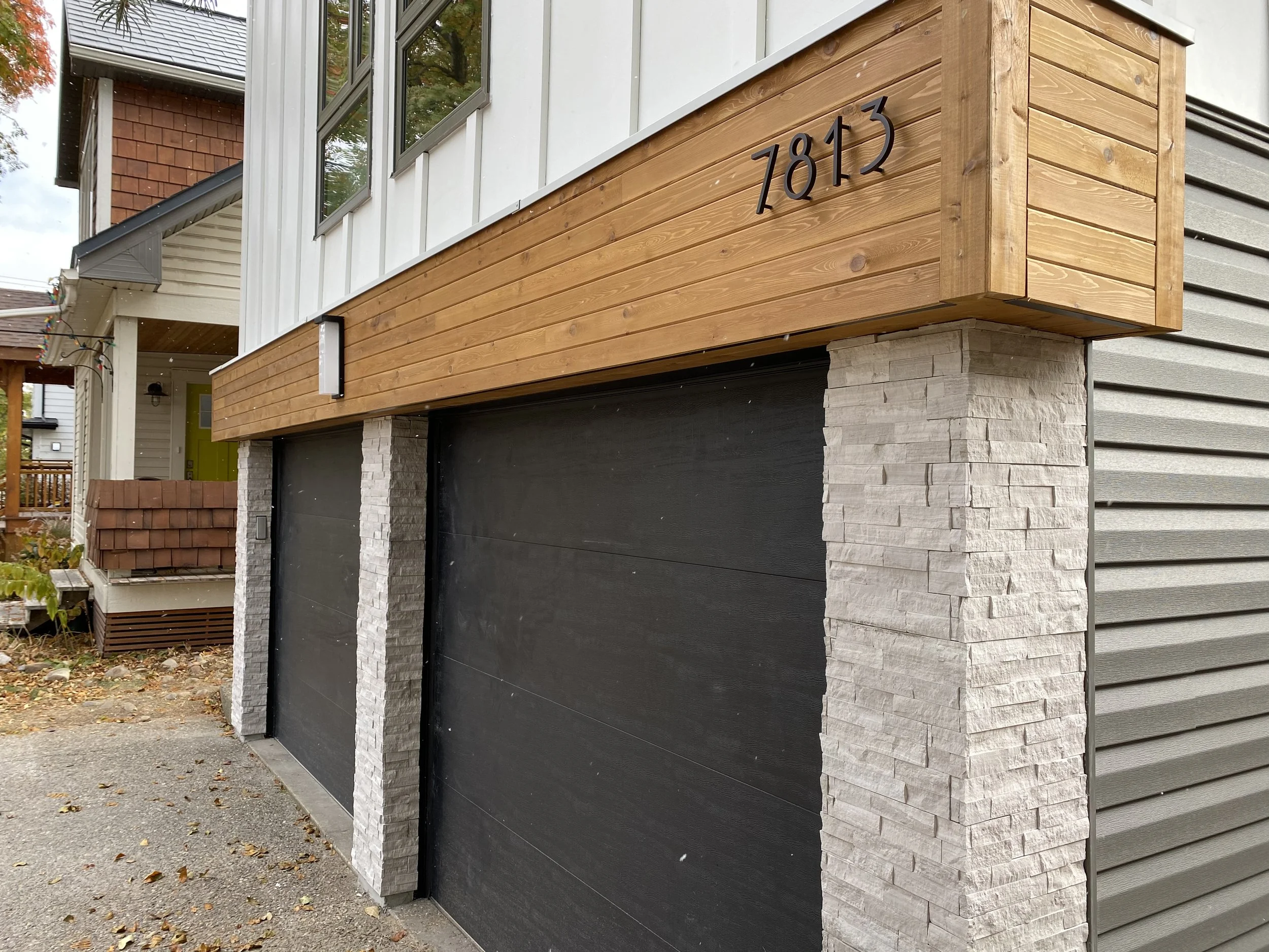 Contemporary siding renovation on a unique 1980s Edmonton home.