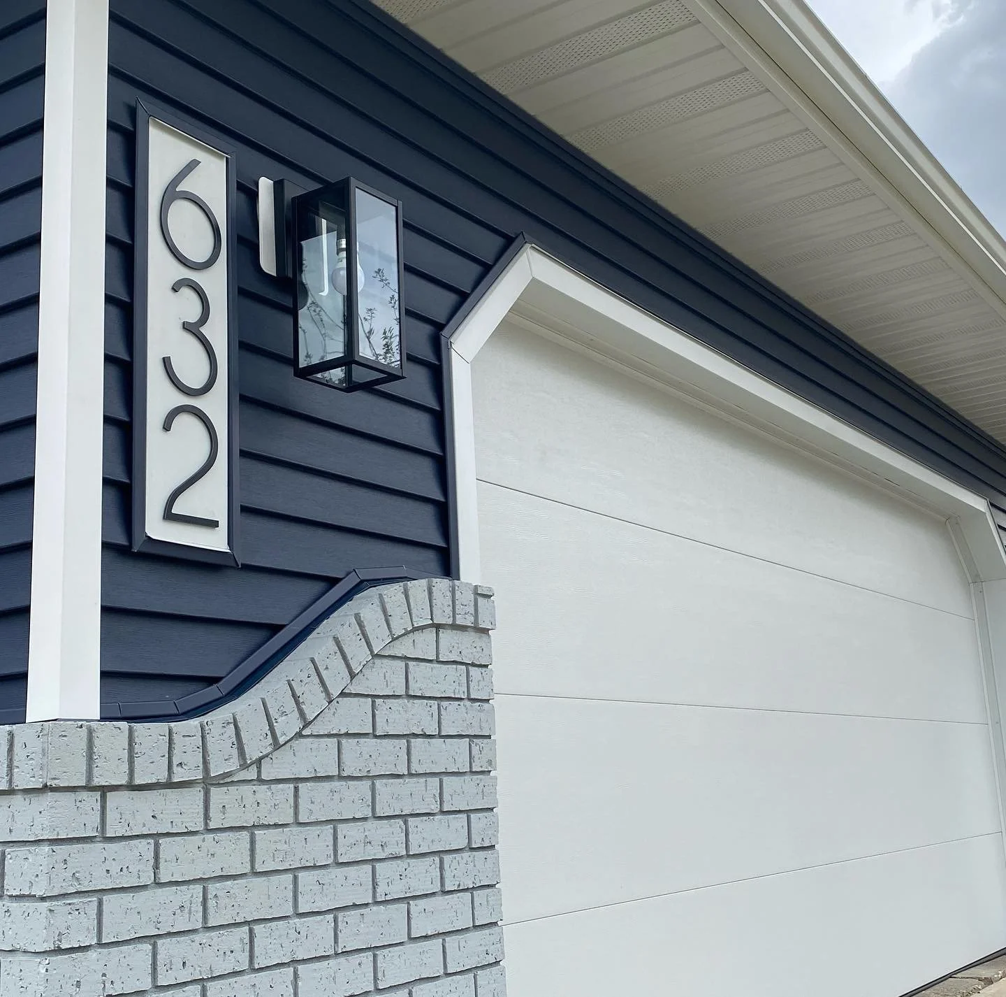 Blue Siding w Gray Brick.JPG