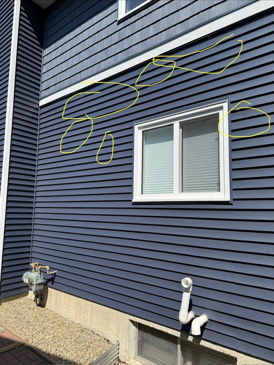vinyl-siding-damaged-by-hail-edmonton-ab.JPG