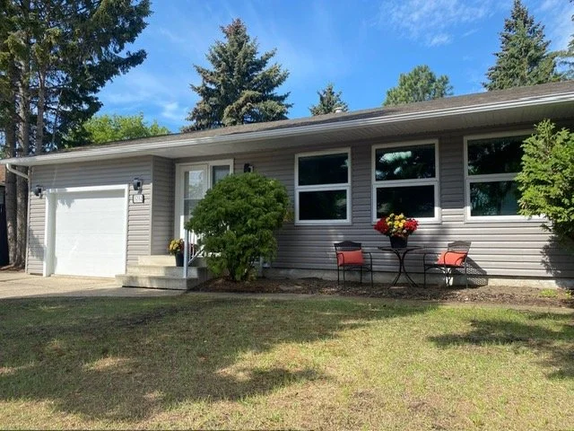 Nice ranch style home with new vinyl siding installed in Edmonton
