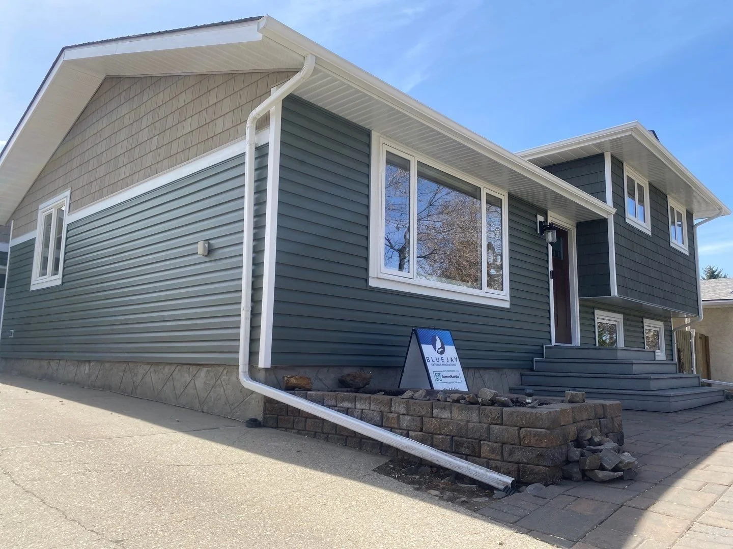 Beautiful edmonton area home with vinyl siding and shingles installed