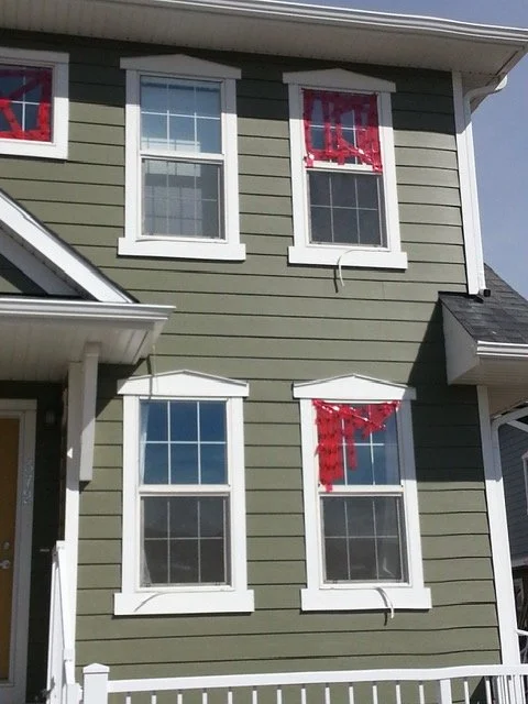 Vinyl casing peeling off window due to high heat from fire