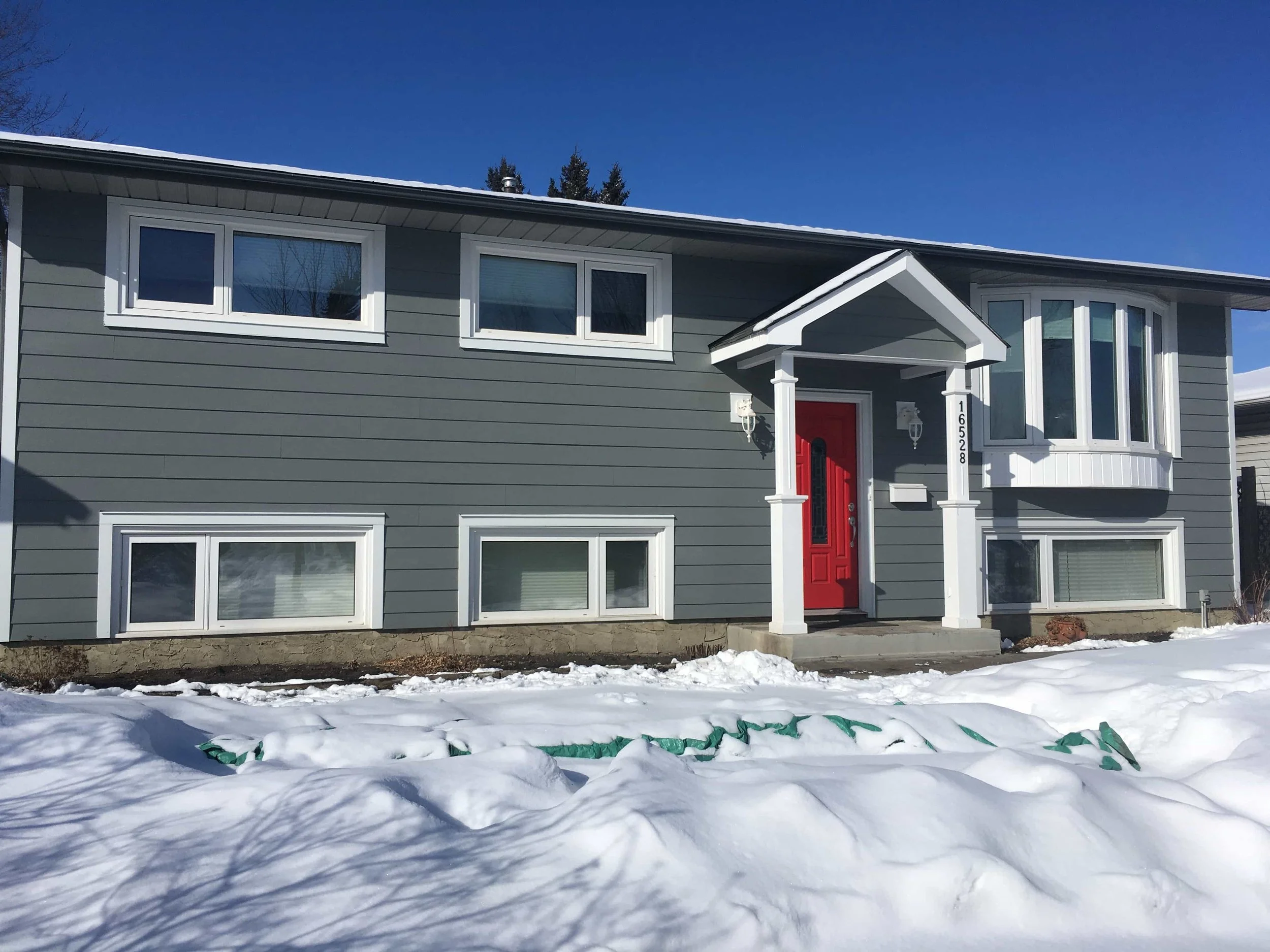 Siding Over Asbestos Stucco.jpg