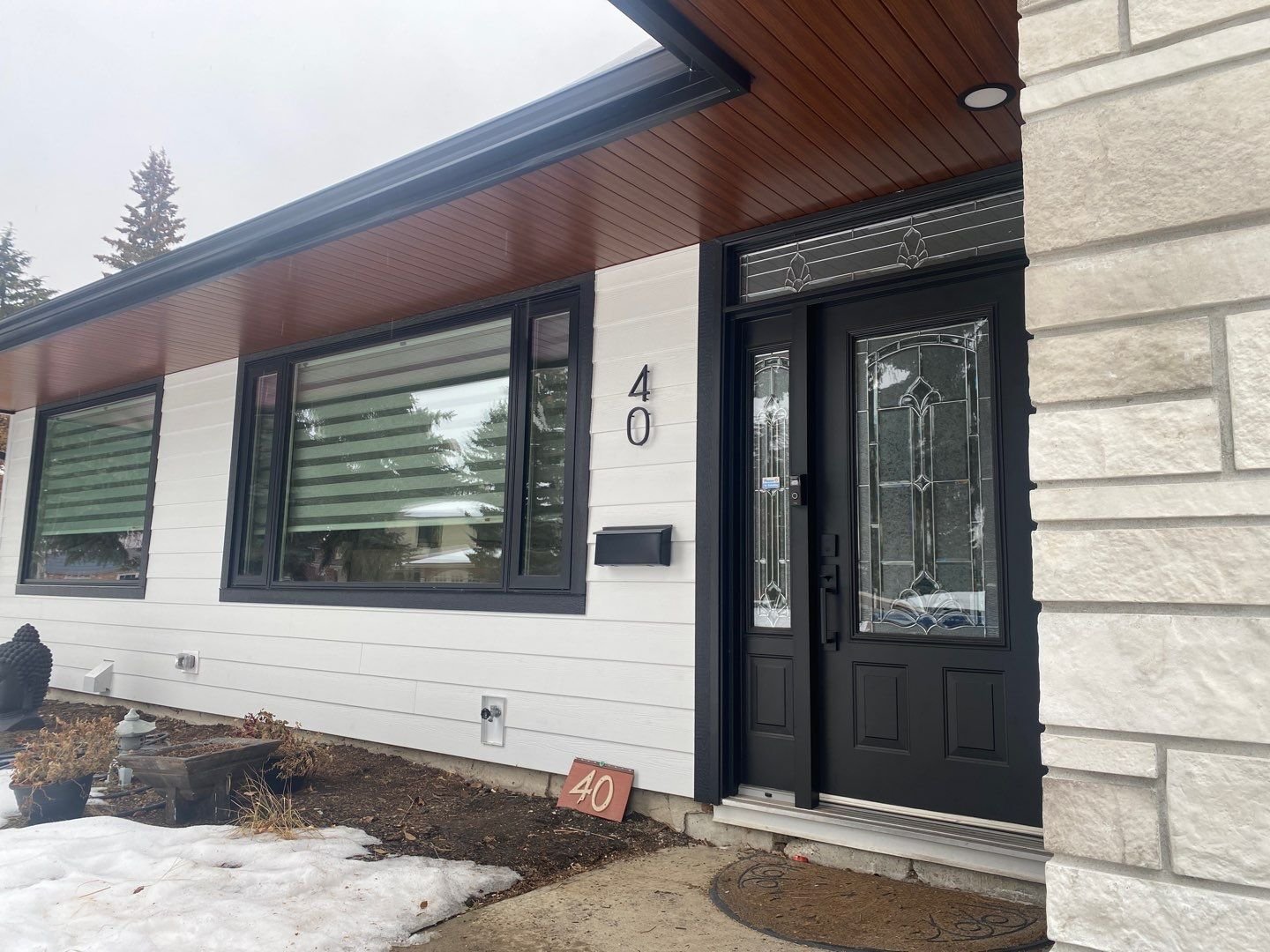 Gorgeous Lux V-Groove soffits look like wood, but with none of the maintenance!