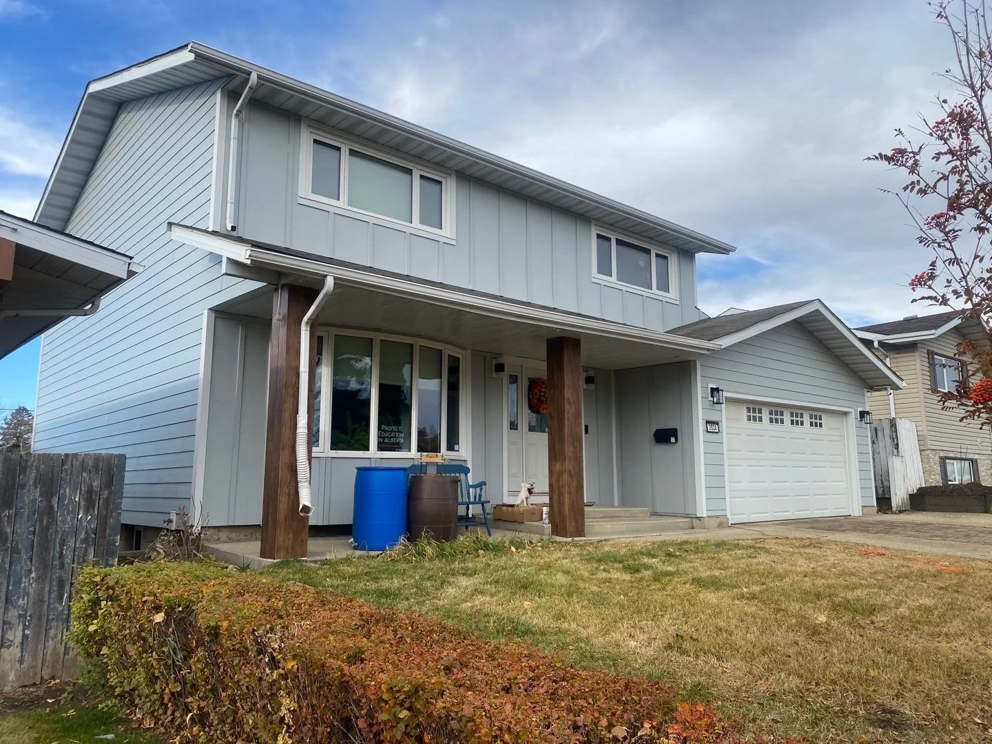 Light Mist Hardie Plank and board and batten on a Beautul Edmonton Home