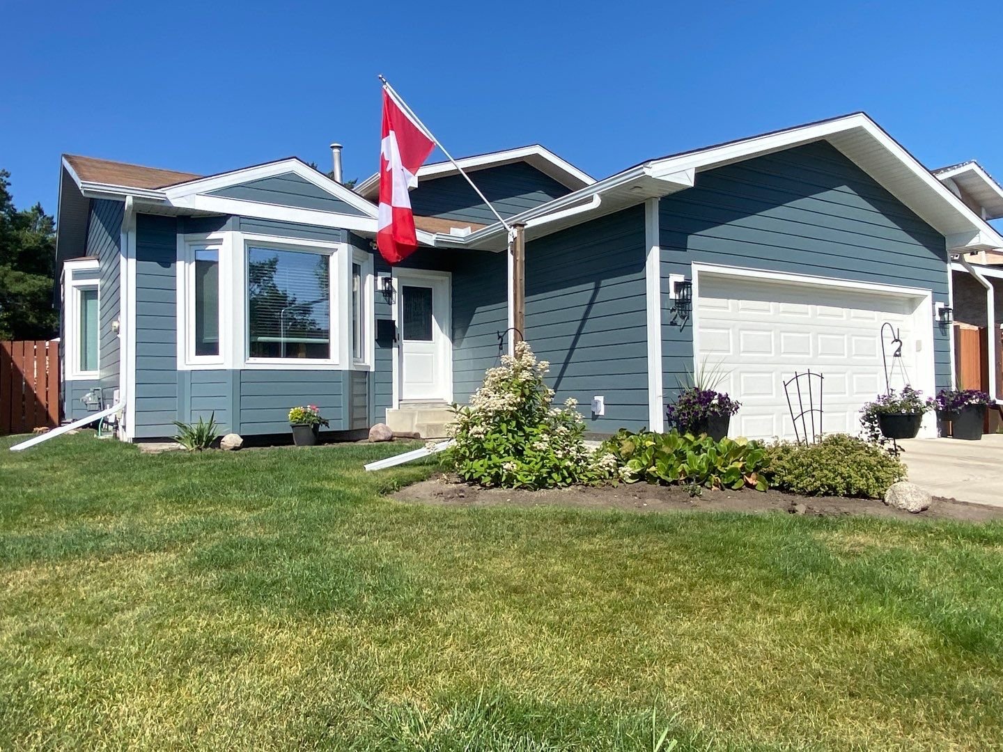 Beautiful Canadian Home with Evening Blue Siding On it