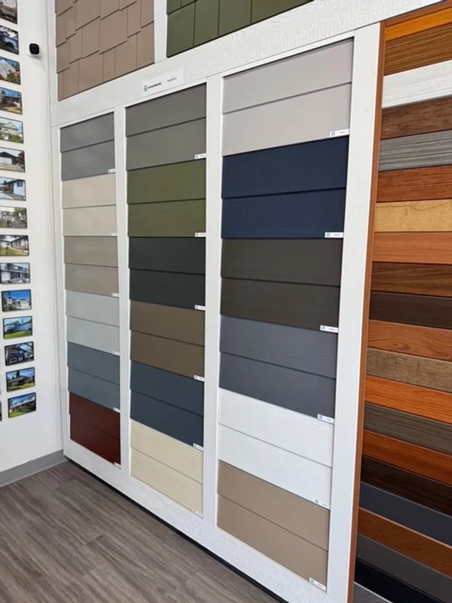 Display wall of all Hardie siding colours at the Blue Jay Exterior Renovations showroom in Edmonton