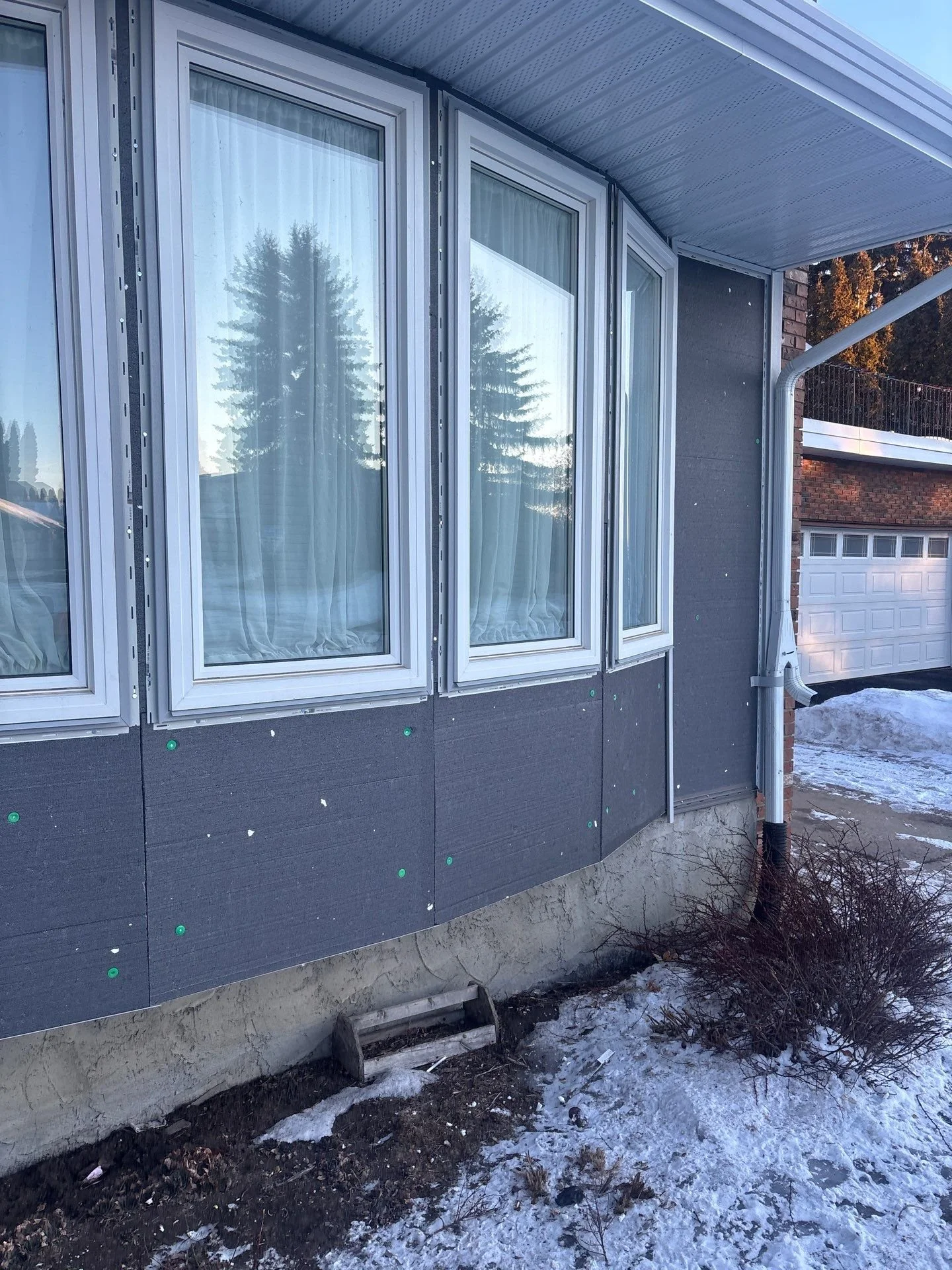 exterior-insulation-on-bow-window-edmonton-ab.jpg