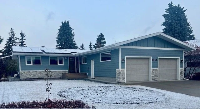 Beautiful home sided in Boothbay Blue Hardie siding by Blue Jay Exterior Renovations