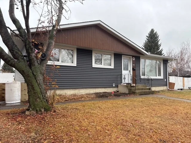 A contemporary vinyl siding renovation on an Edmonton bungalow