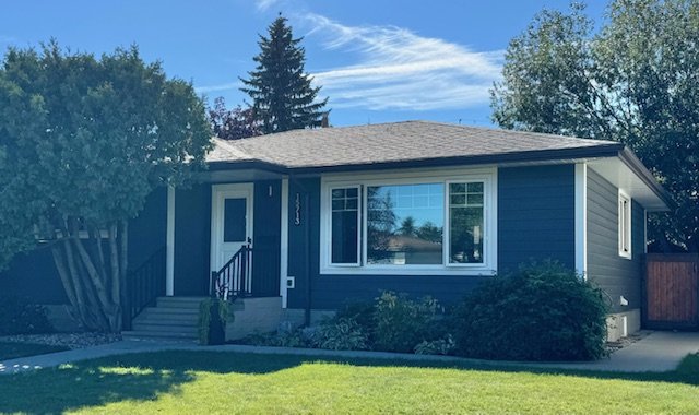 Iron Gray Hardie Plank with Wide White Trims Edmonton