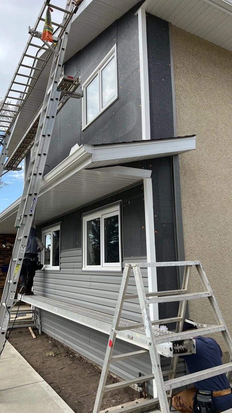 Exterior Insulation with vinyl siding in progress Edmonton AB 