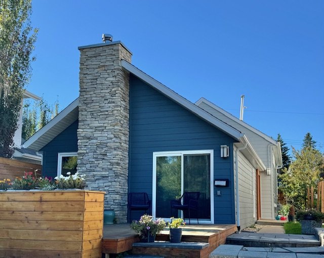 Cool Chalet Style Home with Evening Blue Hardie Board Renovated Exterior