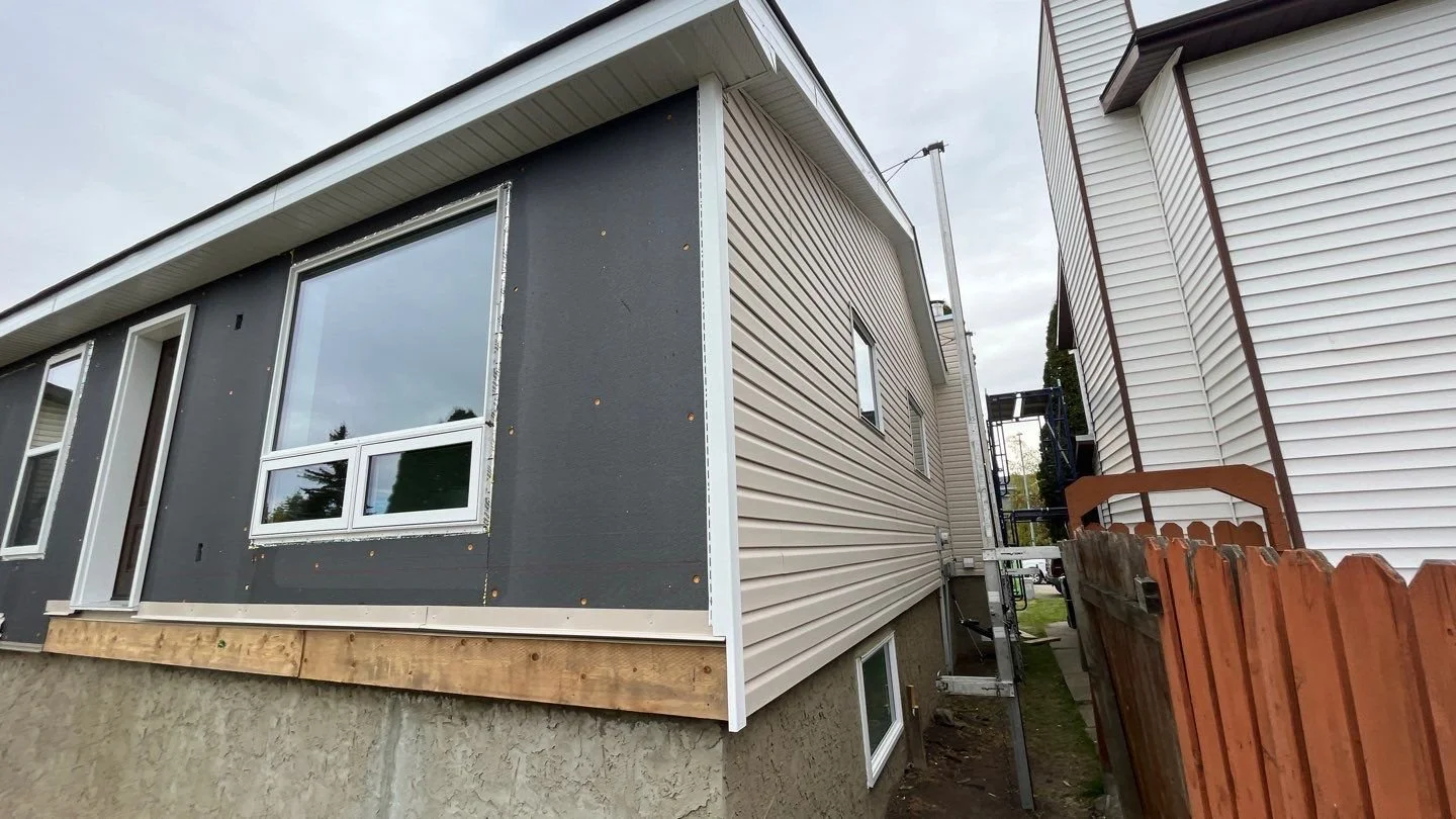 Siding renovation with exterior insulation and vinyl siding in Edmonton