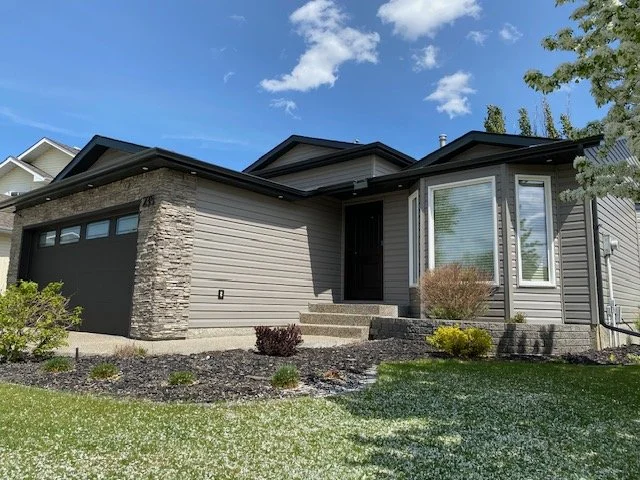Contemporary looking exterior renovation of older home in Edmonton.