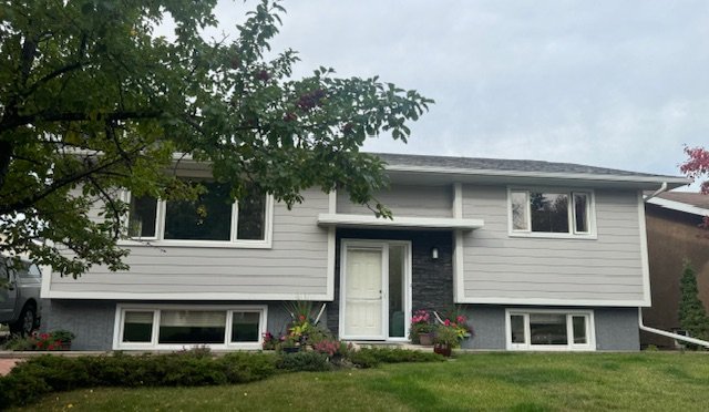 Hardie Pearl Gray on St Albert Home with Nice Stone Accent