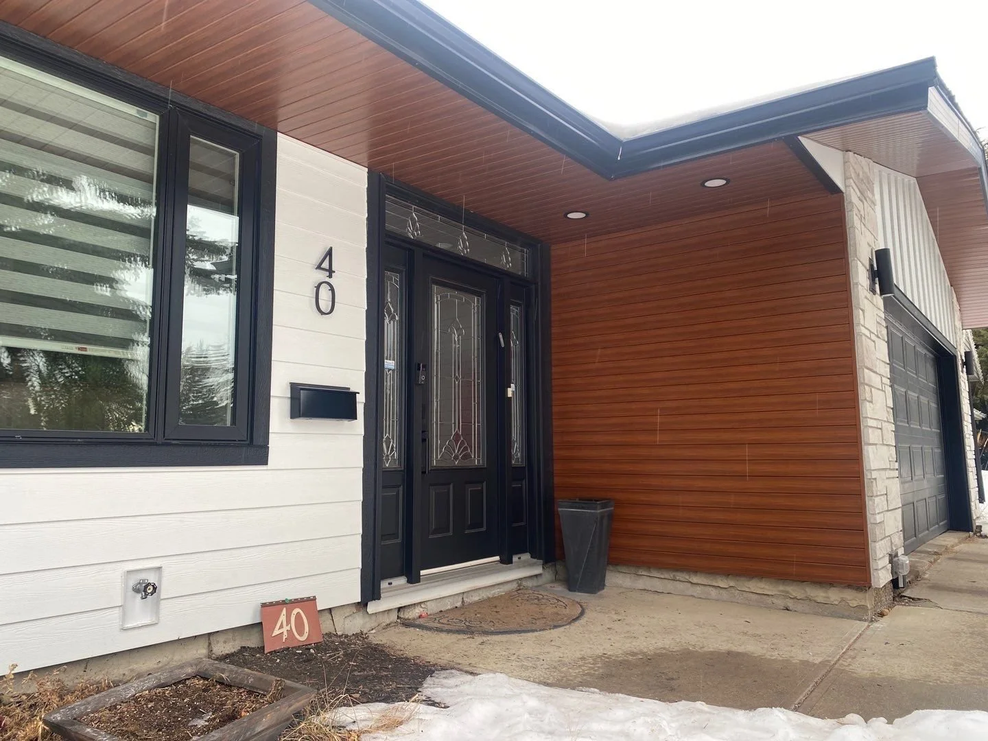 An Edmonton Home with Lux Panel Siding Installed as a feature on the exterior