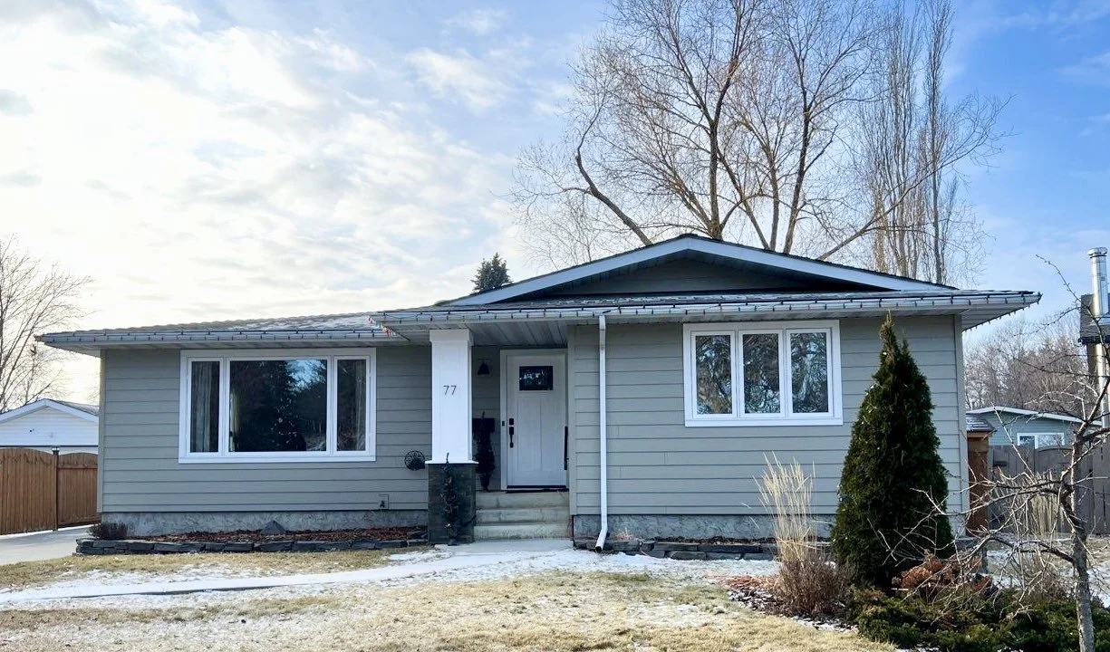 Monterey Taupe Hardie Board home St Albert