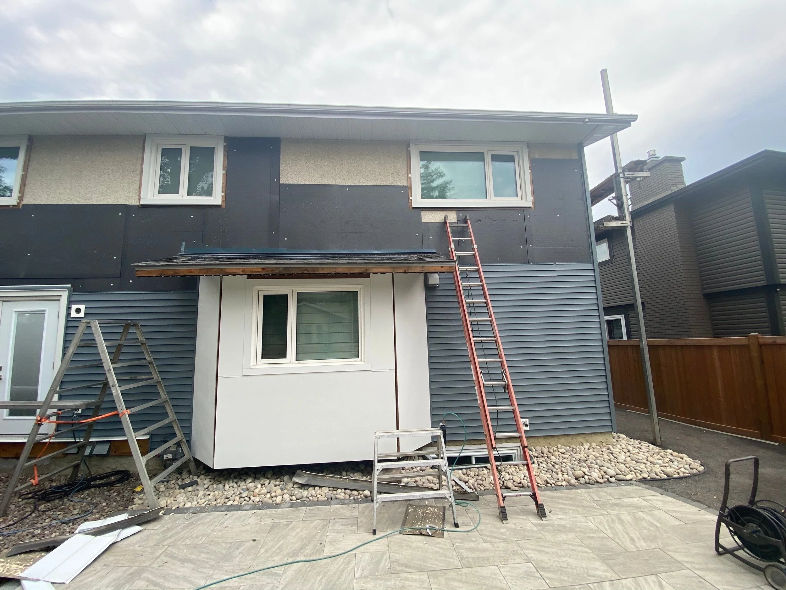 Vinyl Siding over Stucco.JPEG