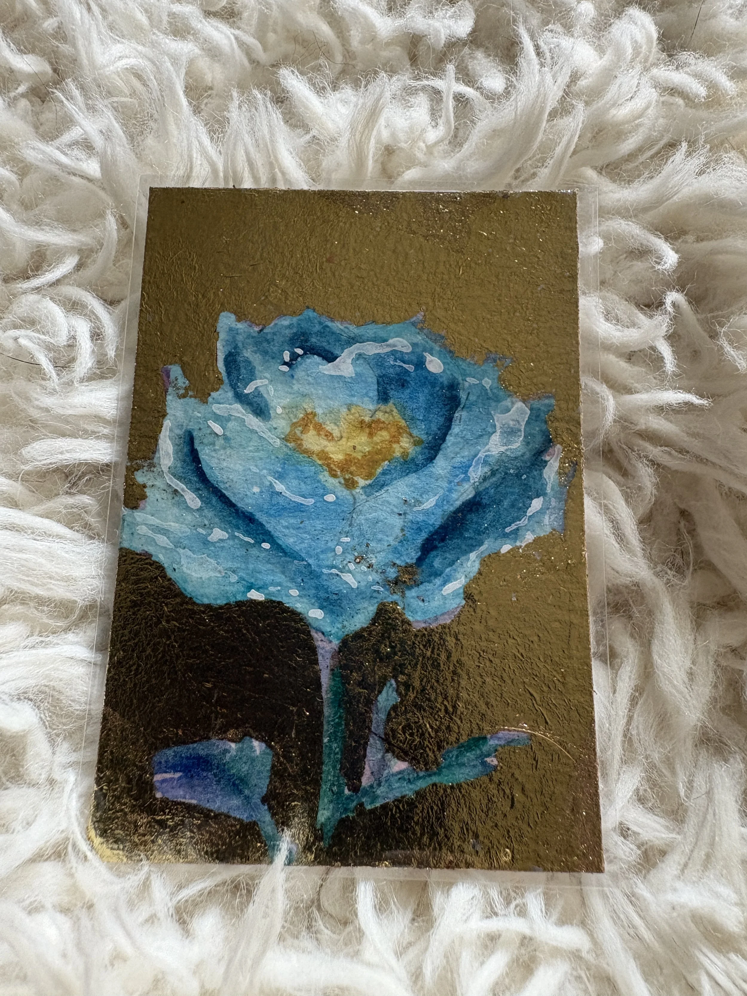 P-31	Blue Rose in Gold