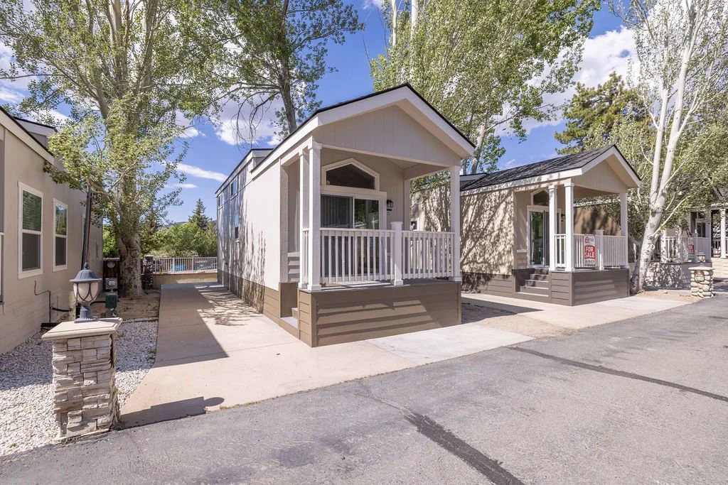 Two brand new tiny homes for sale side-by-side at Big Bear Mobile Estates in Big Bear Lake, CA.