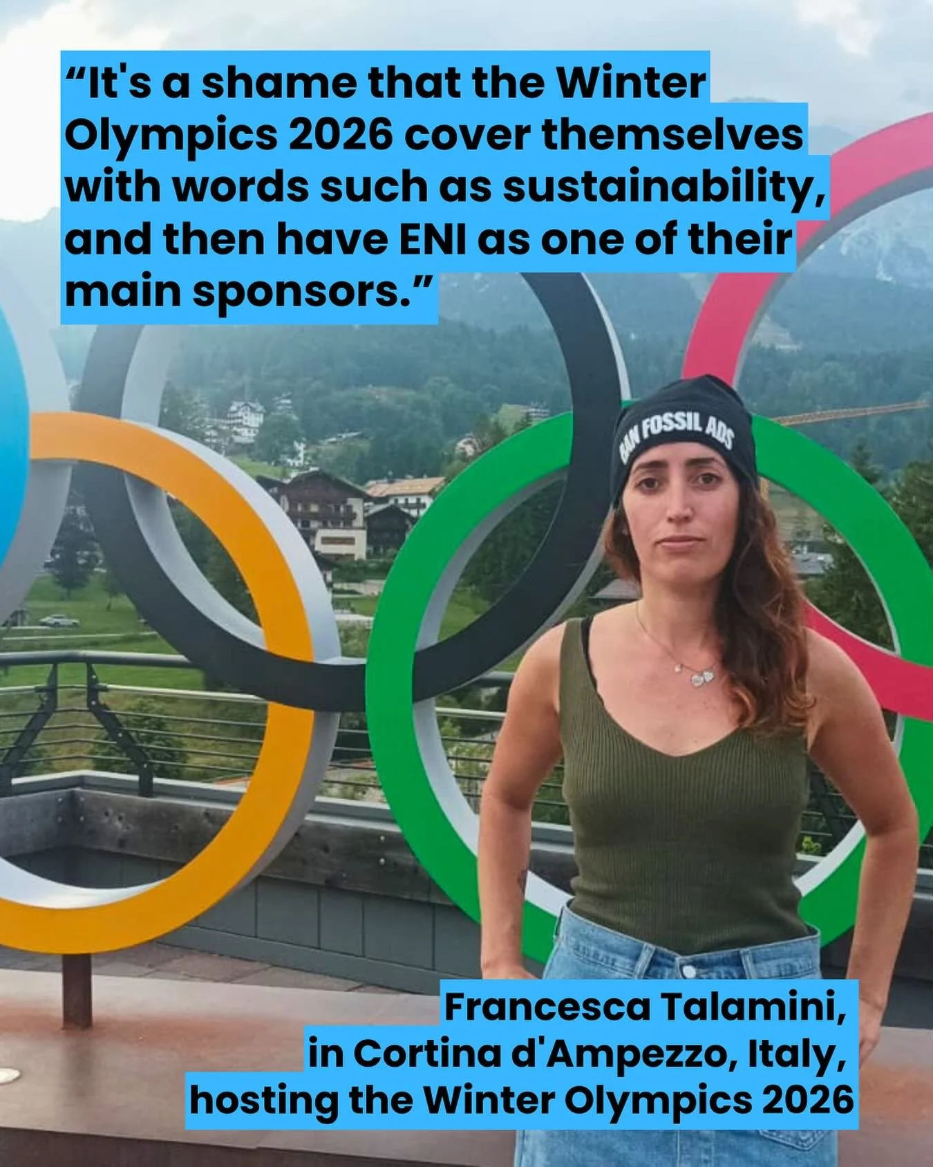 Right in front of the Olympic rings in Cortina d&rsquo;Ampezzo, Francesca Talamini puts on the banfossil-ads beanie to raise her voice against Winter Olympics 2026 @milanocortina2026 polluting sponsor Eni, the giant Italian oil company. 

This pollut