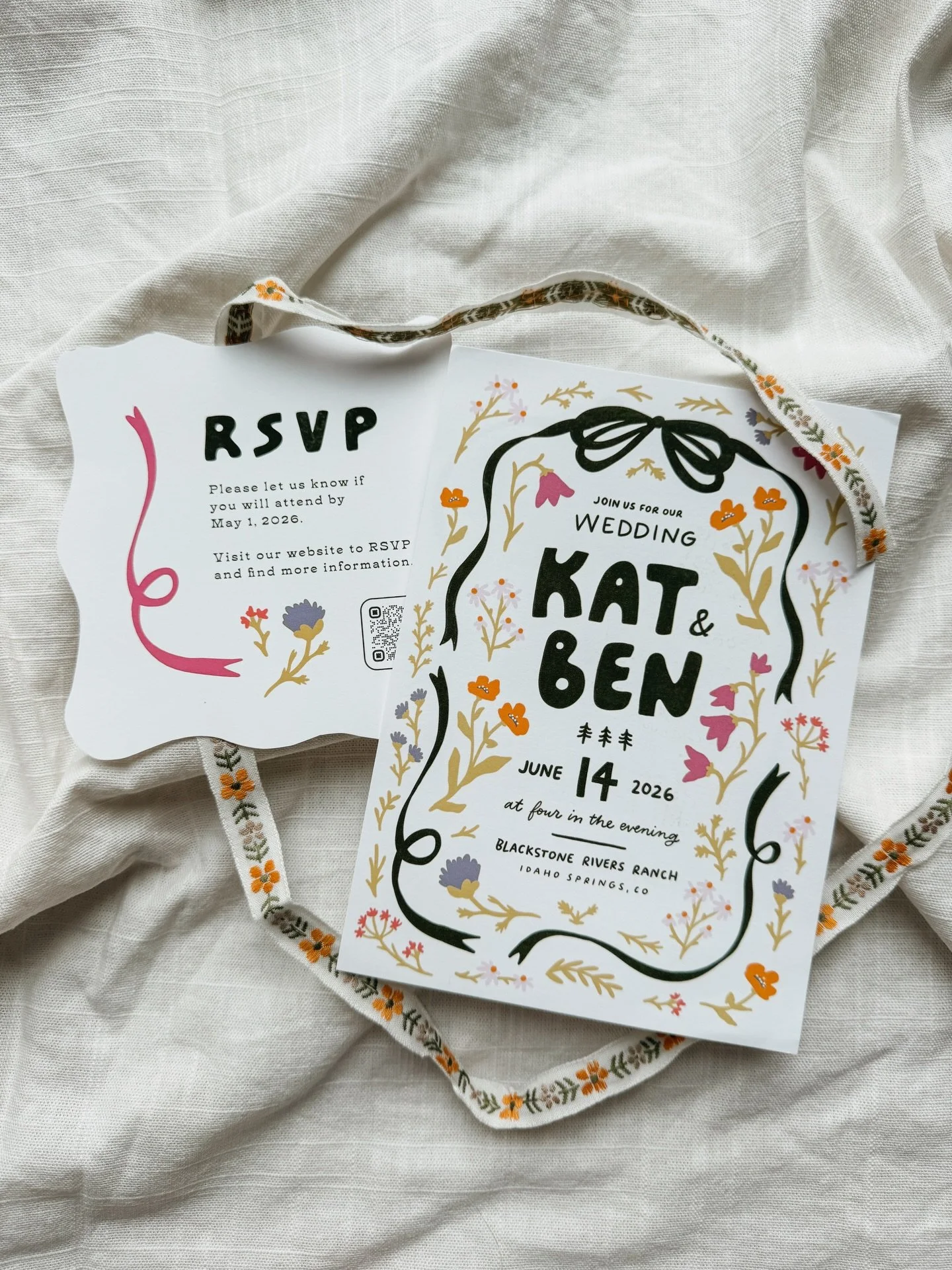 details from this wedding invite package

lots of credit to my sister for the printing and production, she added the sleeve, ribbon, and heart cutout, plus they did all the cutting by hand - love when invites showcase the couple&rsquo;s personality a